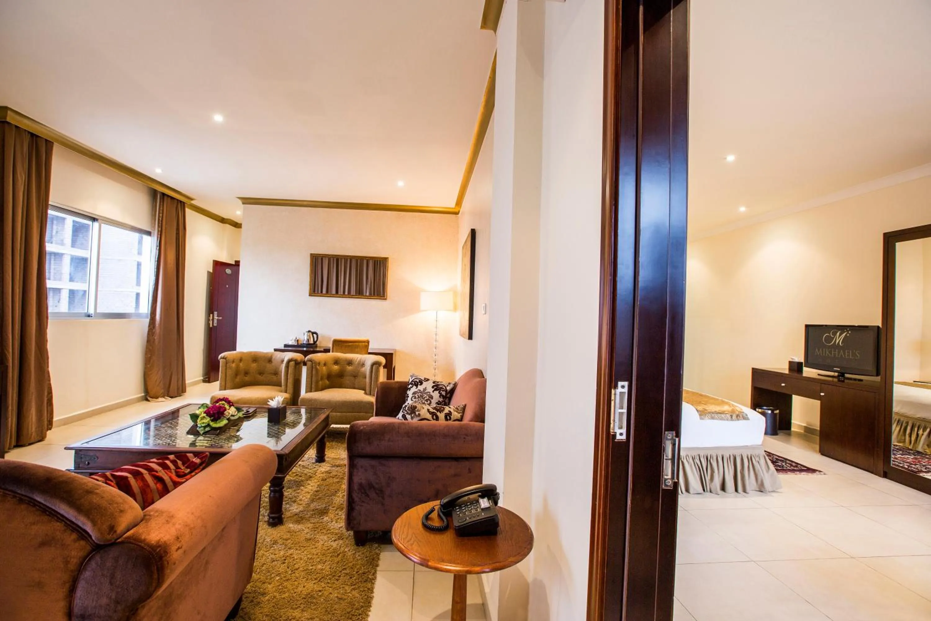 Living room, Bed in Mikhael's Hotel