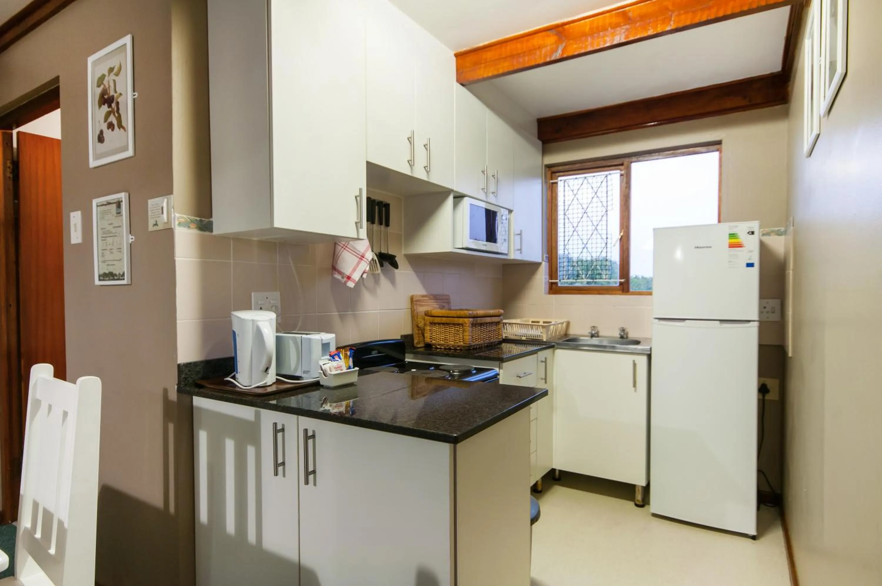 Kitchen or kitchenette in Pine Lodge Resort