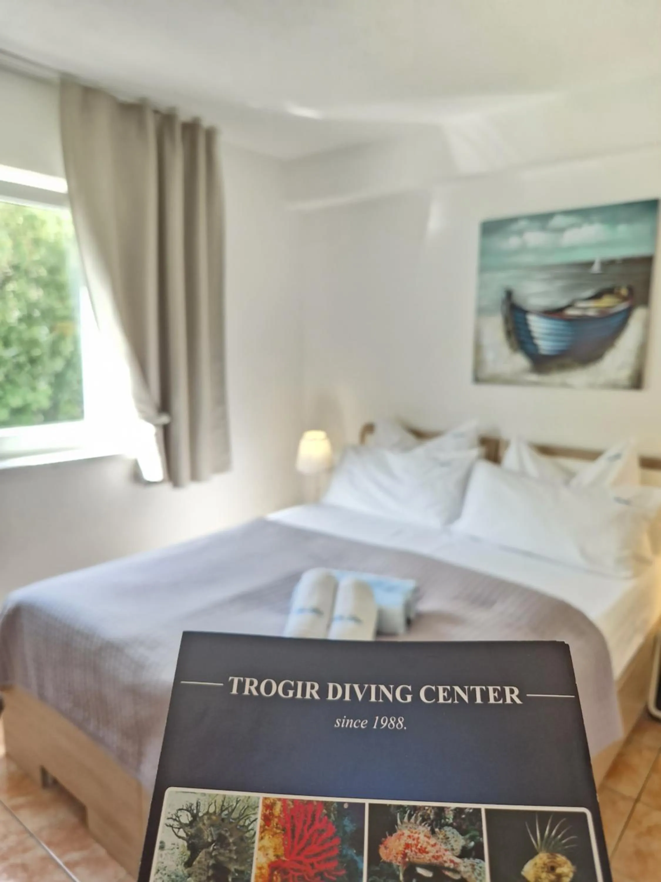 Bed in Apartments Silva with a view of sea