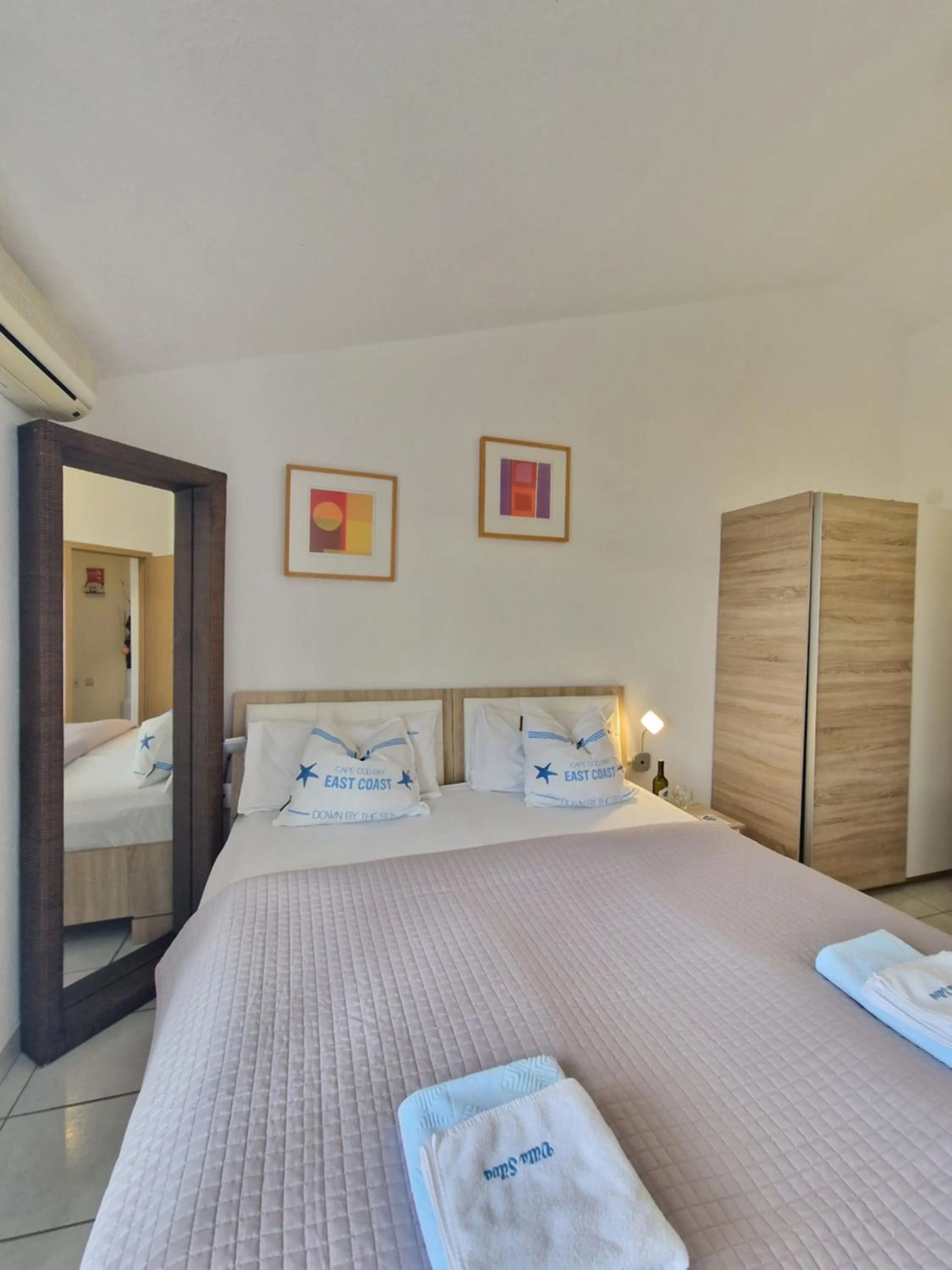 Bed in Apartments Silva with a view of sea