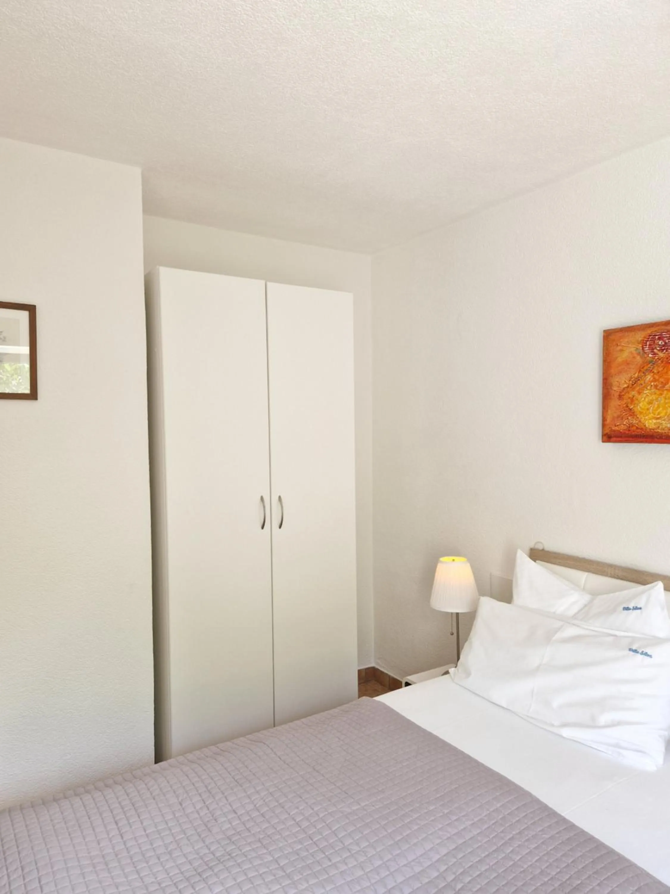 Bed in Apartments Silva with a view of sea