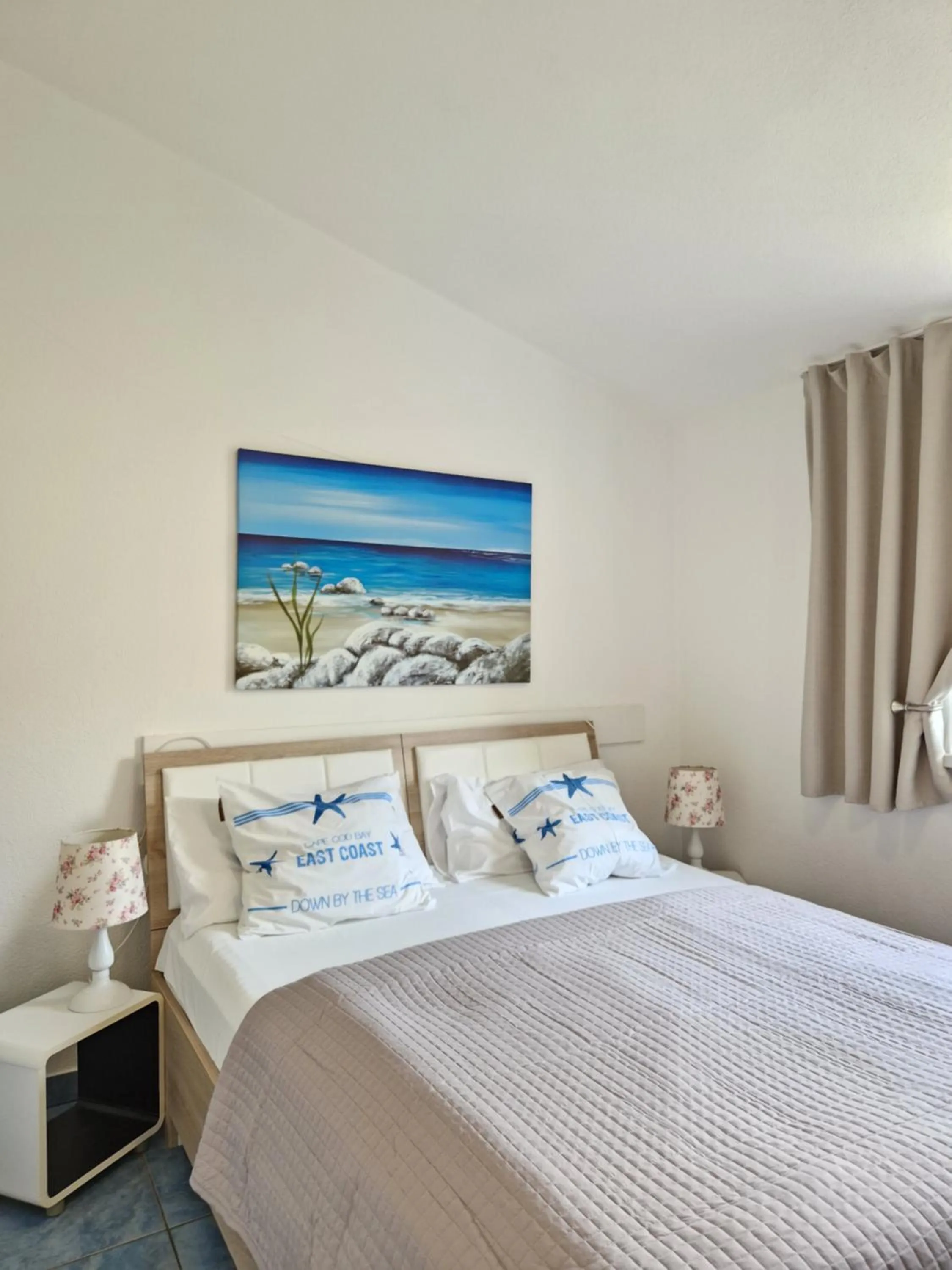 Bed in Apartments Silva with a view of sea