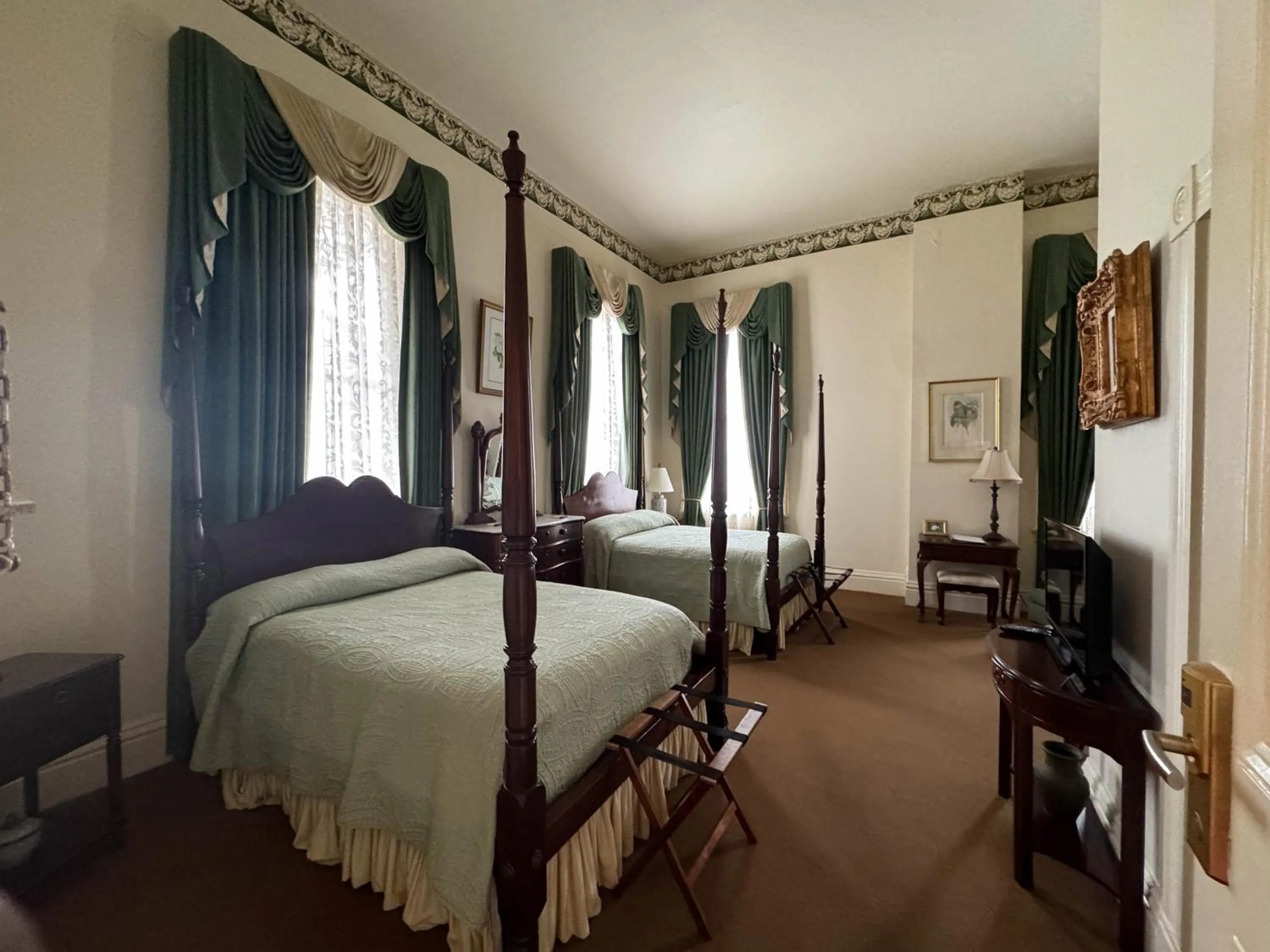 Bedroom in The Guest House Historic Mansion
