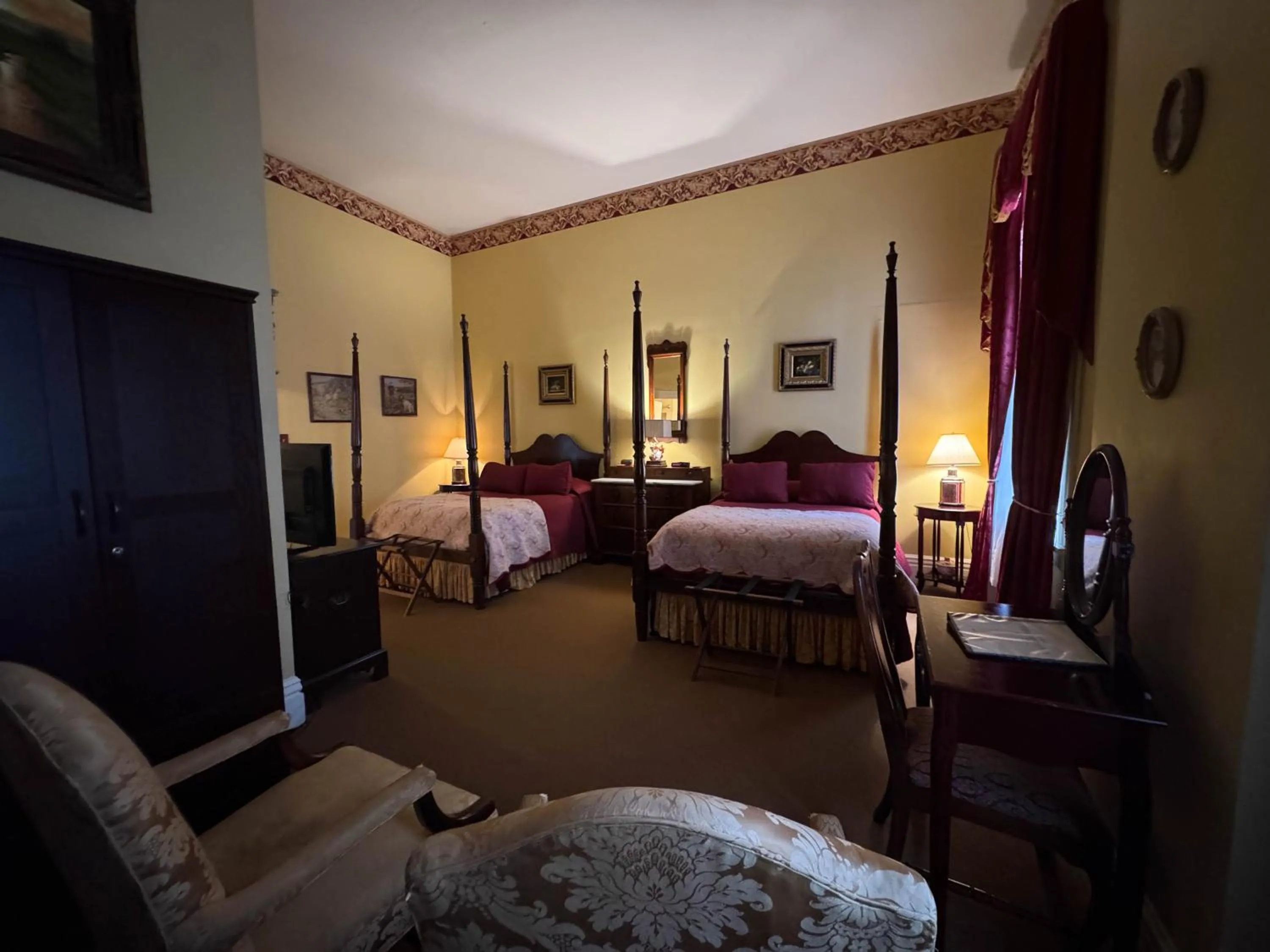 Bedroom in The Guest House Historic Mansion