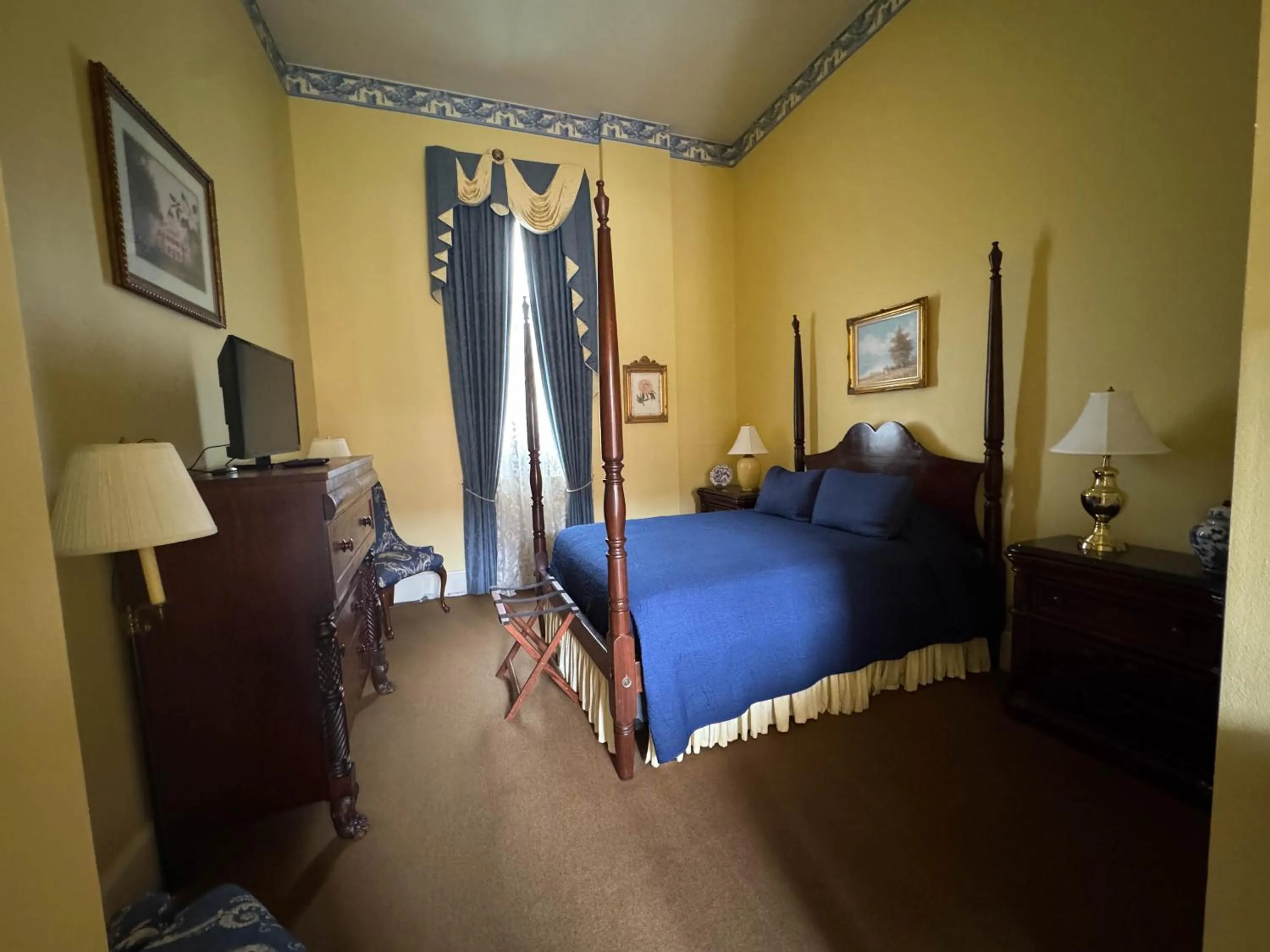 Bedroom in The Guest House Historic Mansion
