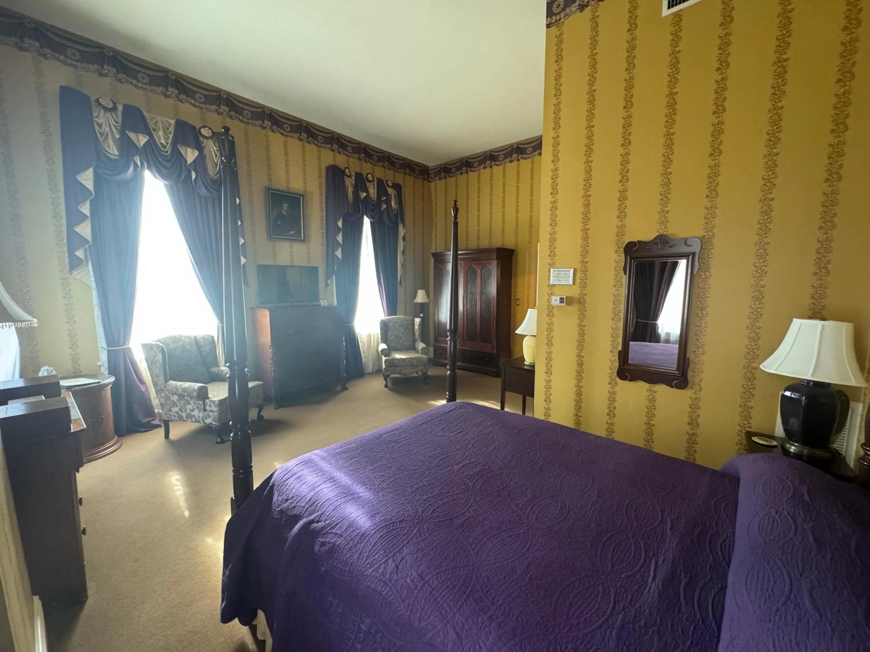 Bed in The Guest House Historic Mansion