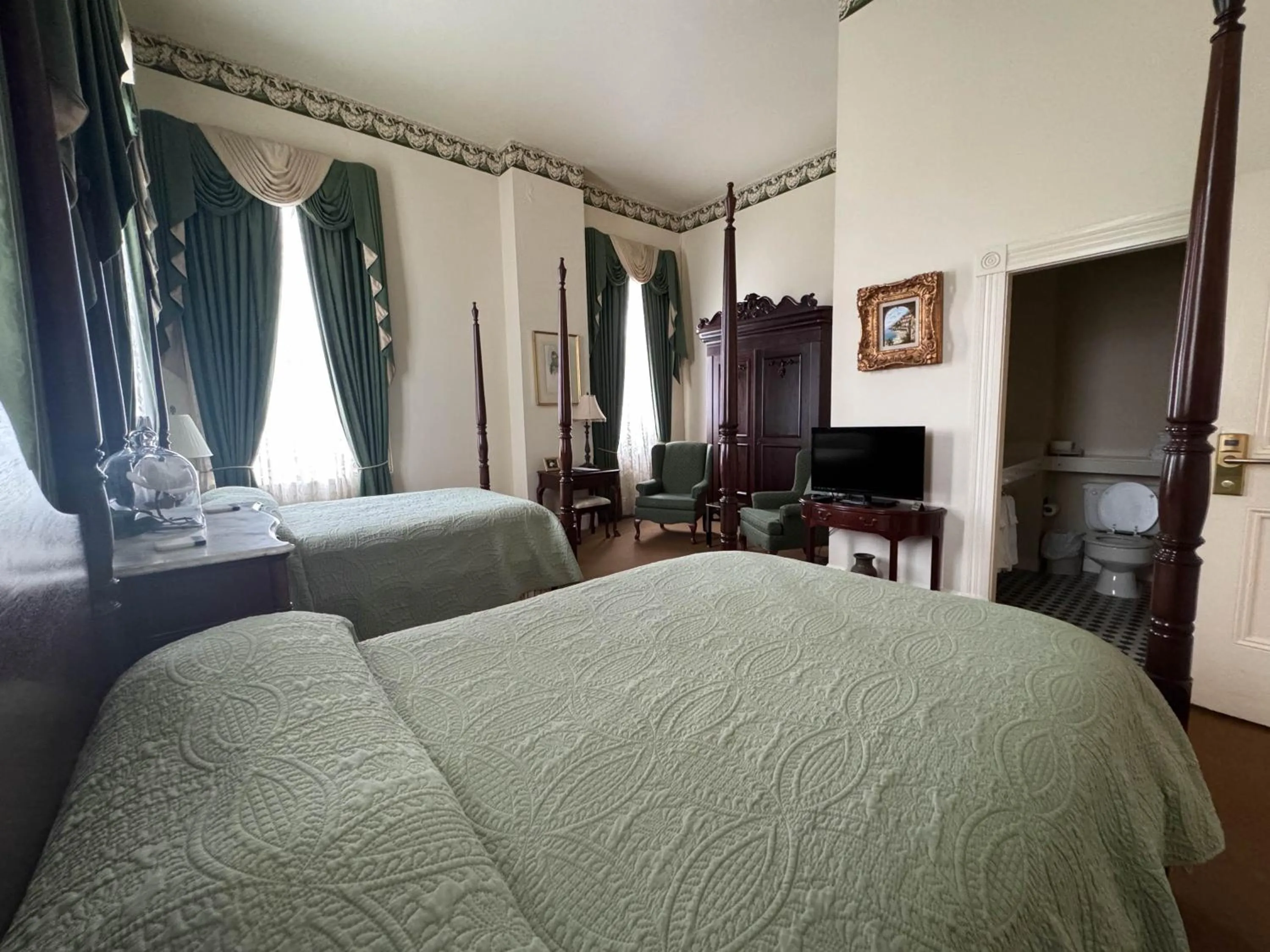 Bedroom in The Guest House Historic Mansion