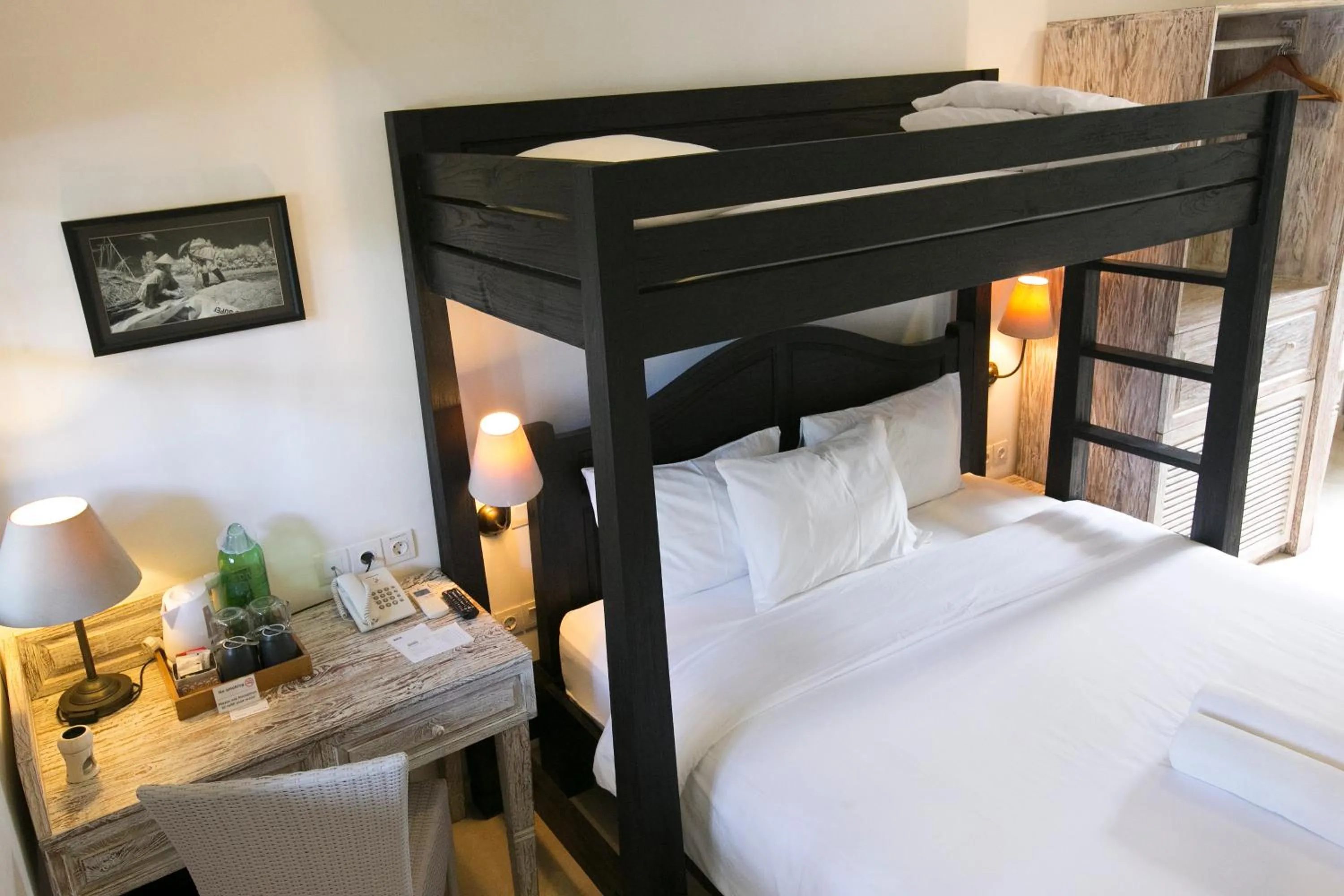 Bed in OK Divers Resort & Spa