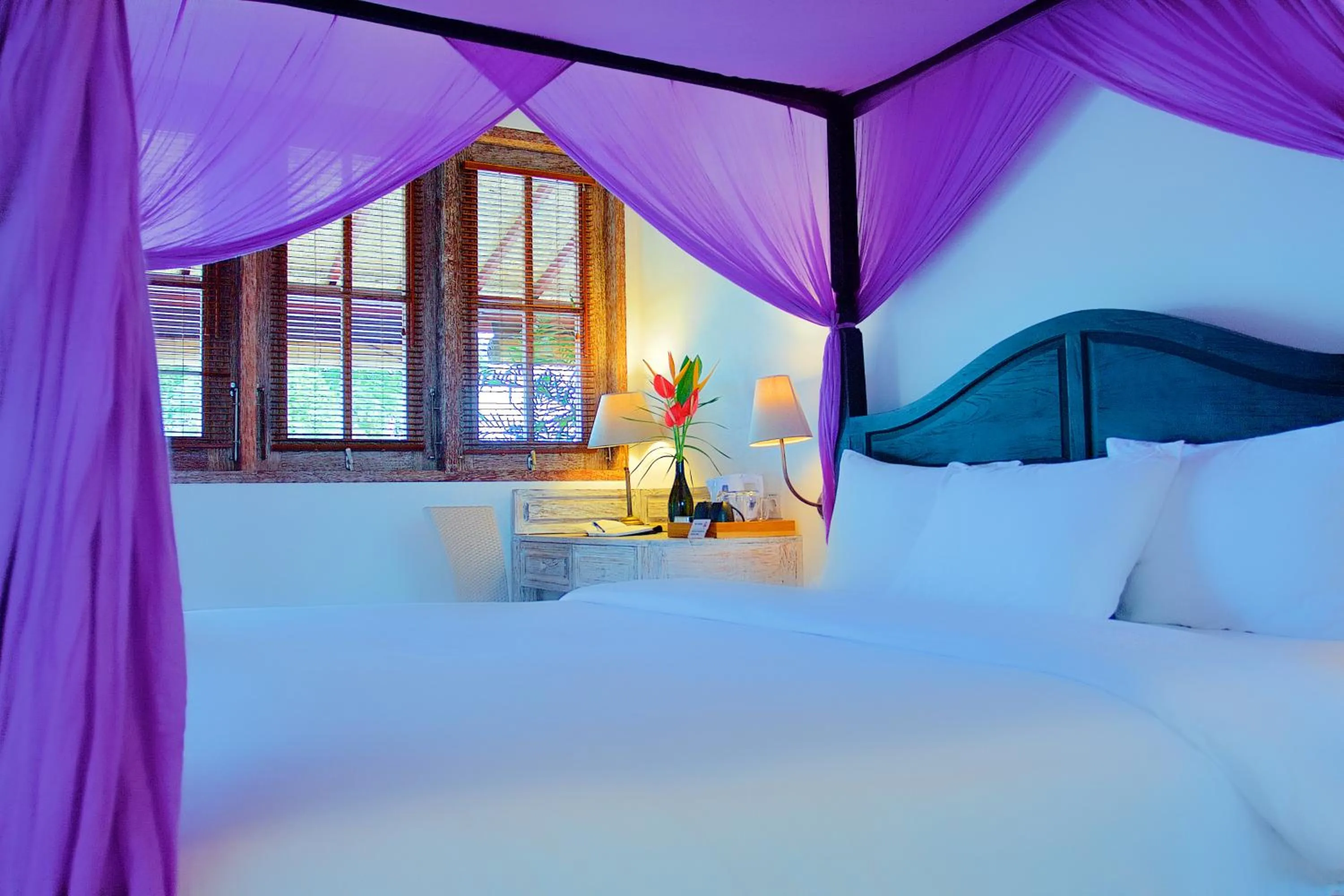 Bed in OK Divers Resort & Spa