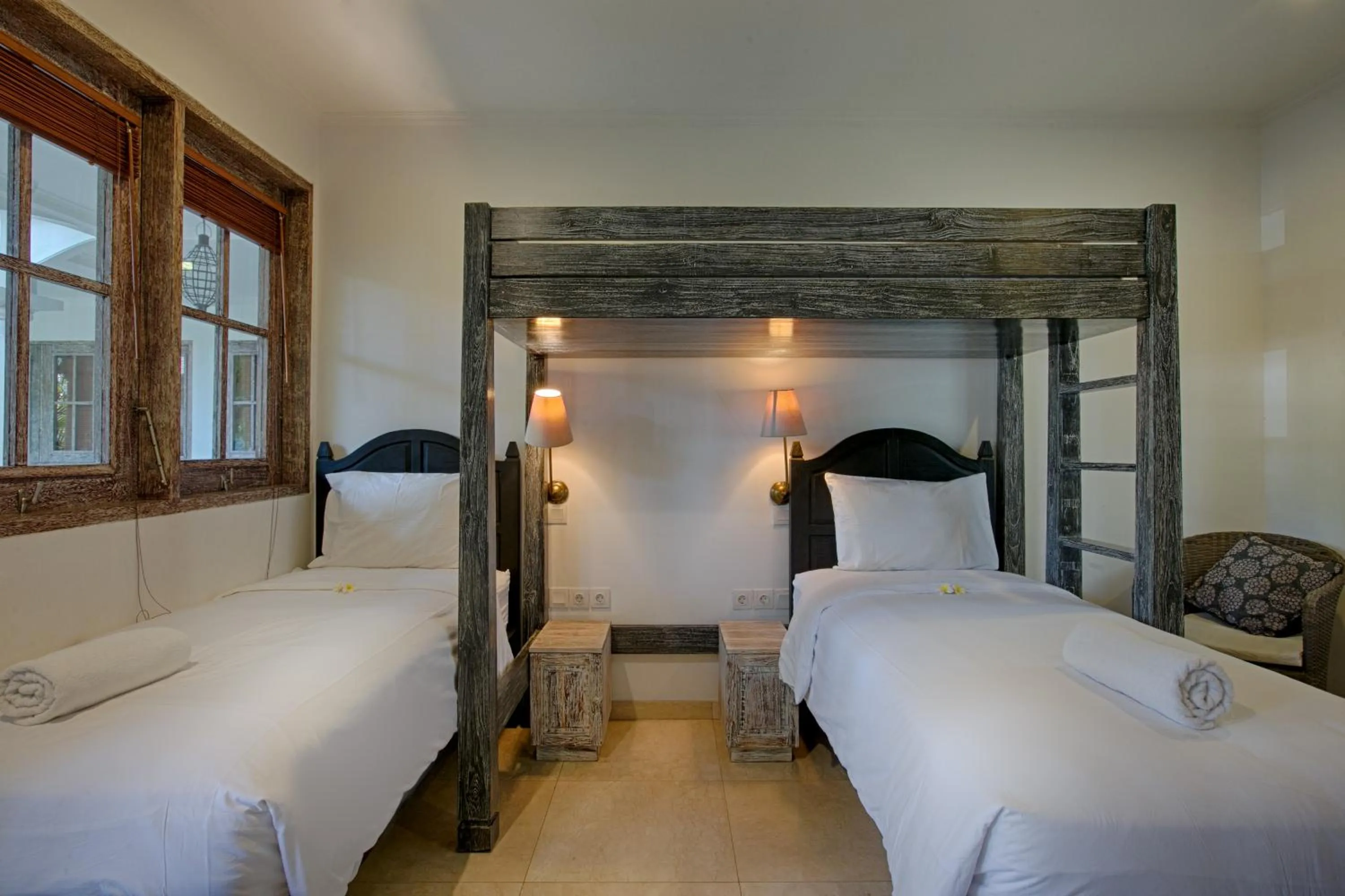 Bed in OK Divers Resort & Spa