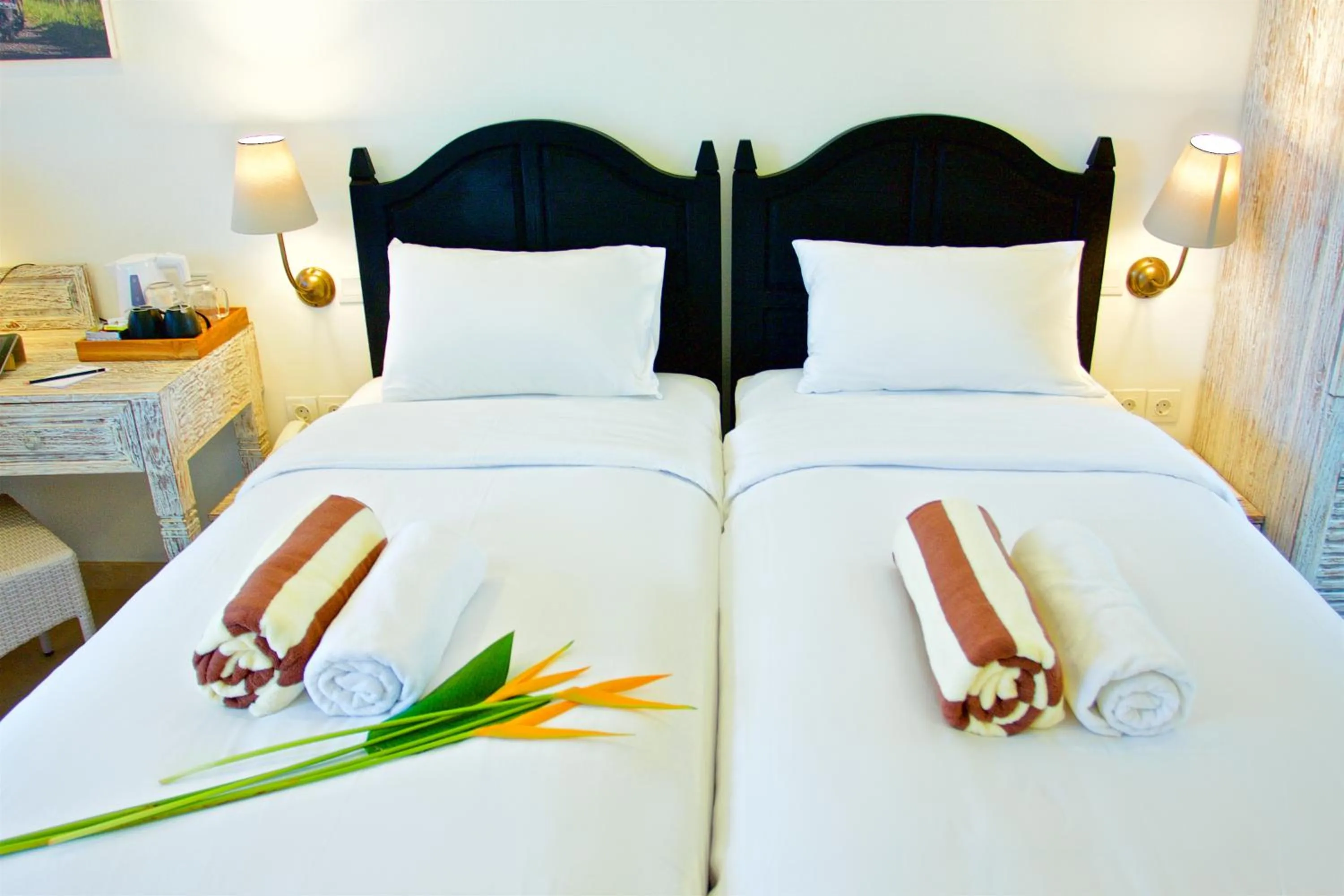 Bed in OK Divers Resort & Spa