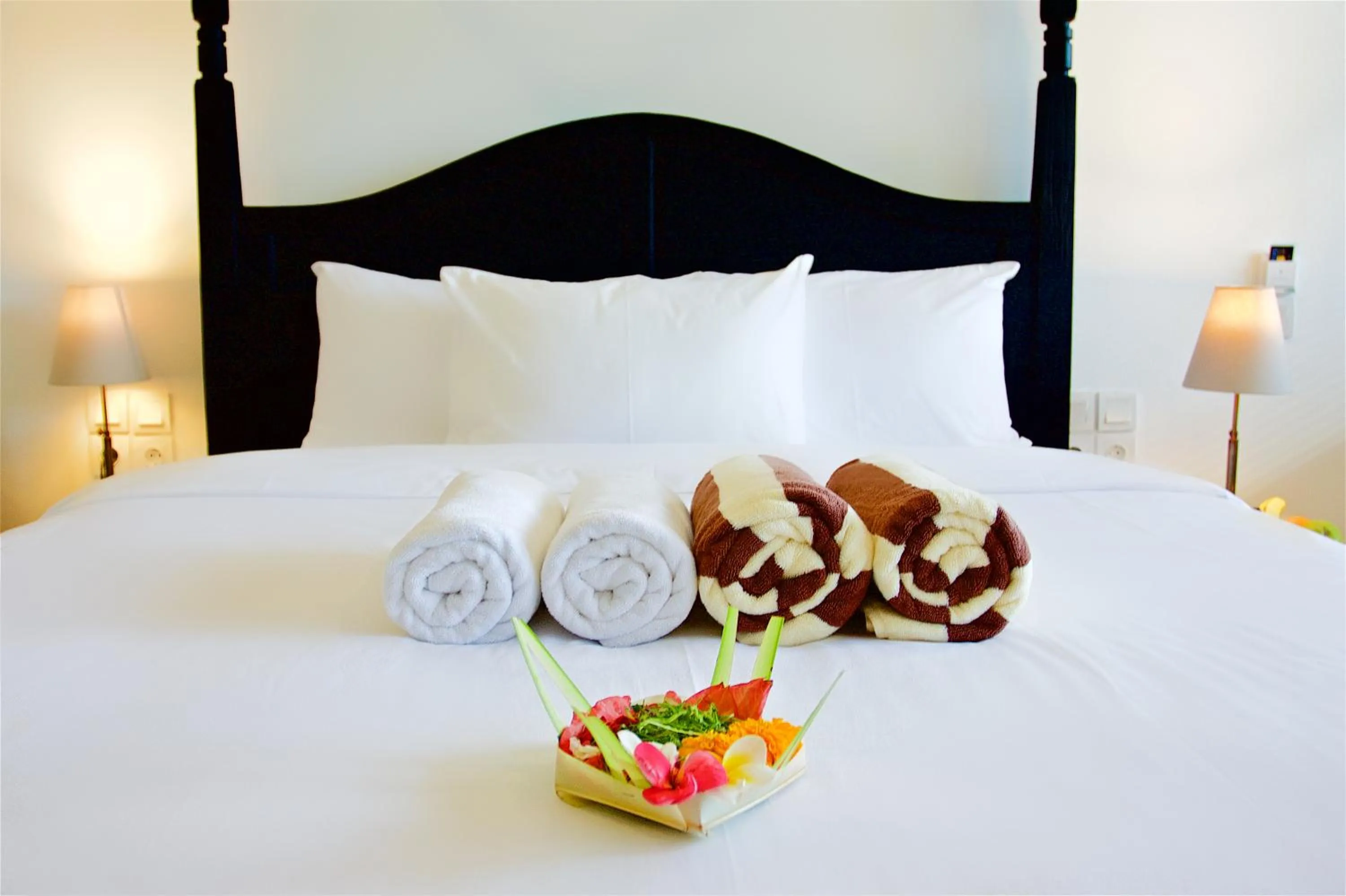 Bed in OK Divers Resort & Spa