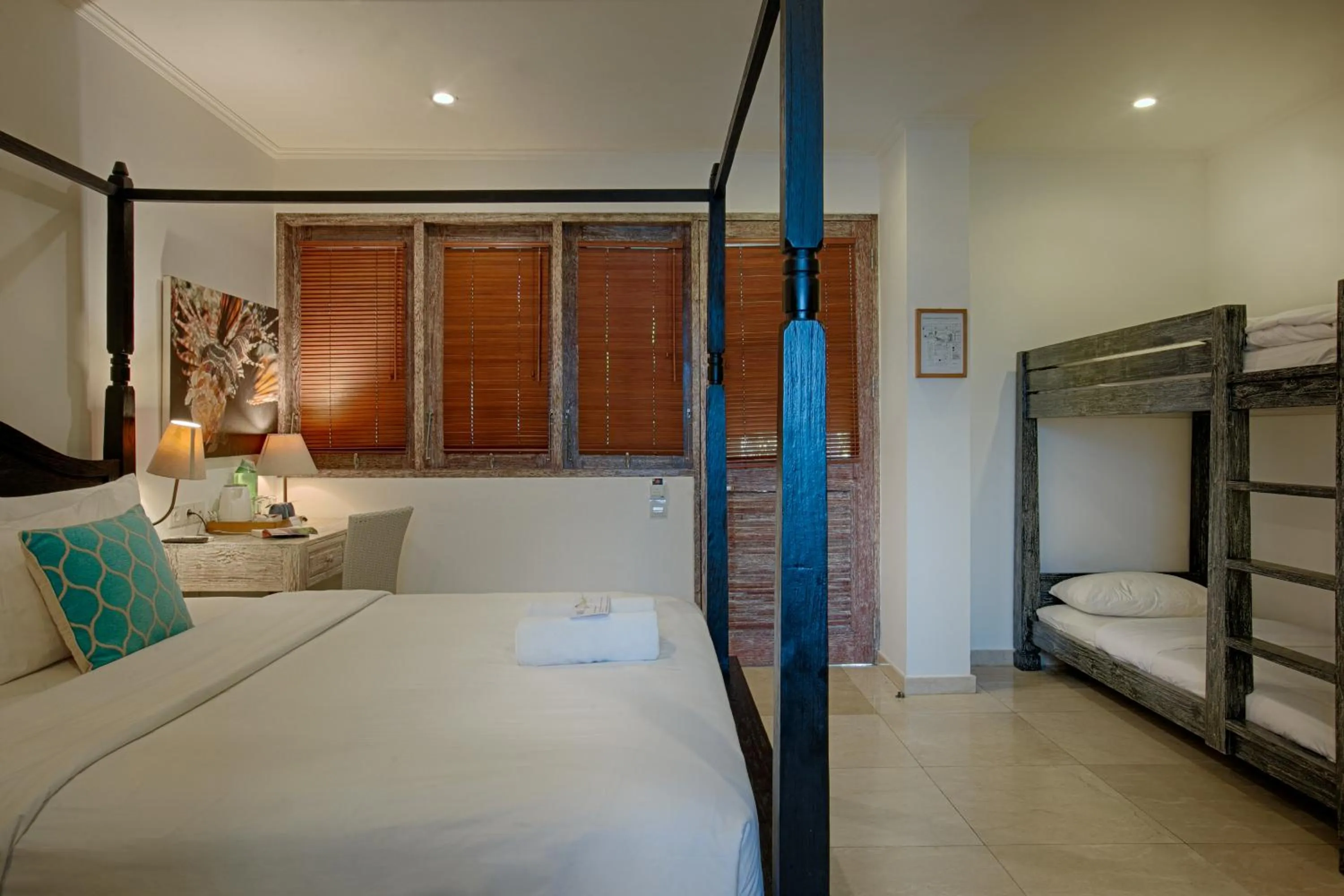 Bed in OK Divers Resort & Spa