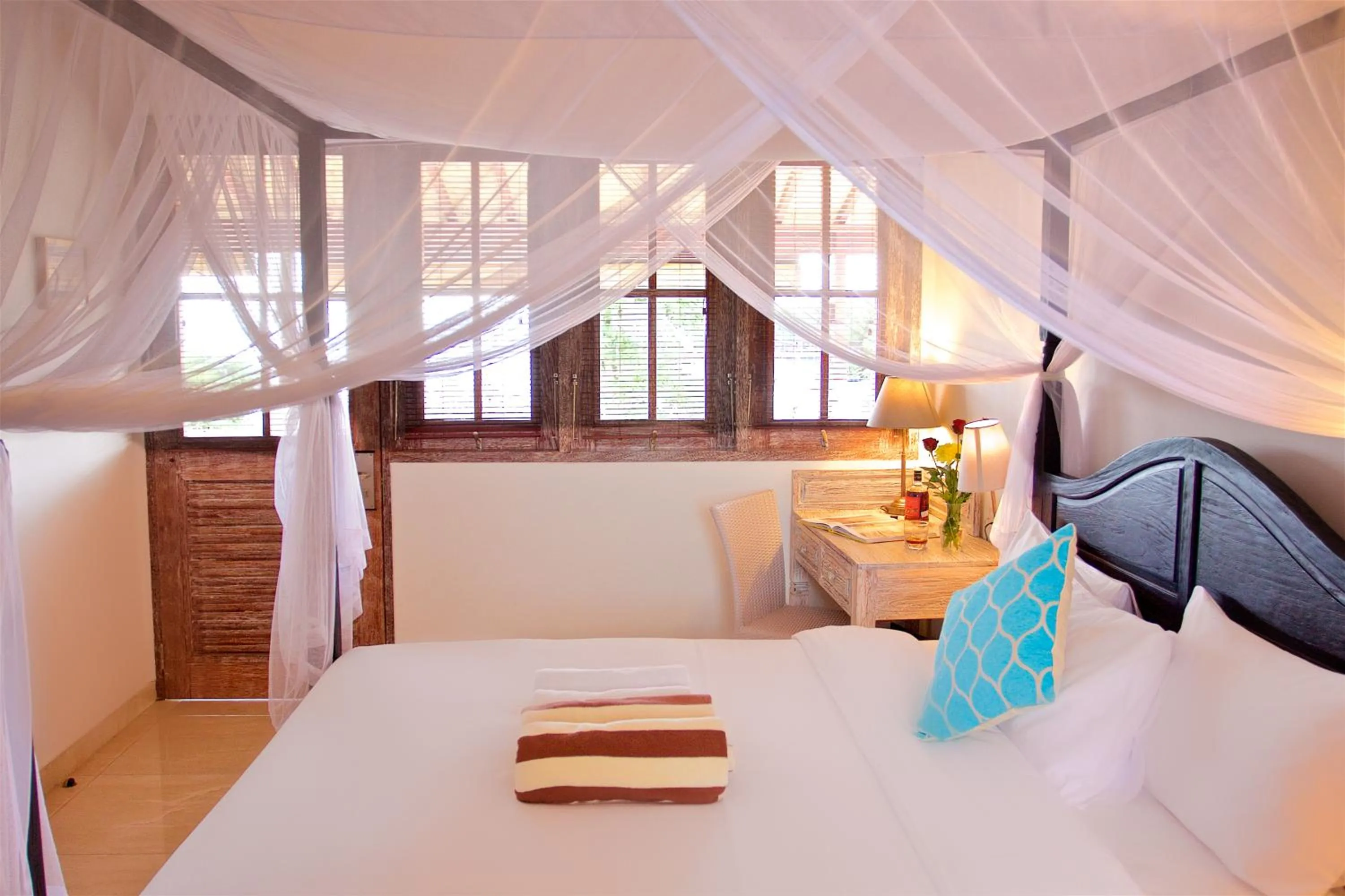 Bed in OK Divers Resort & Spa