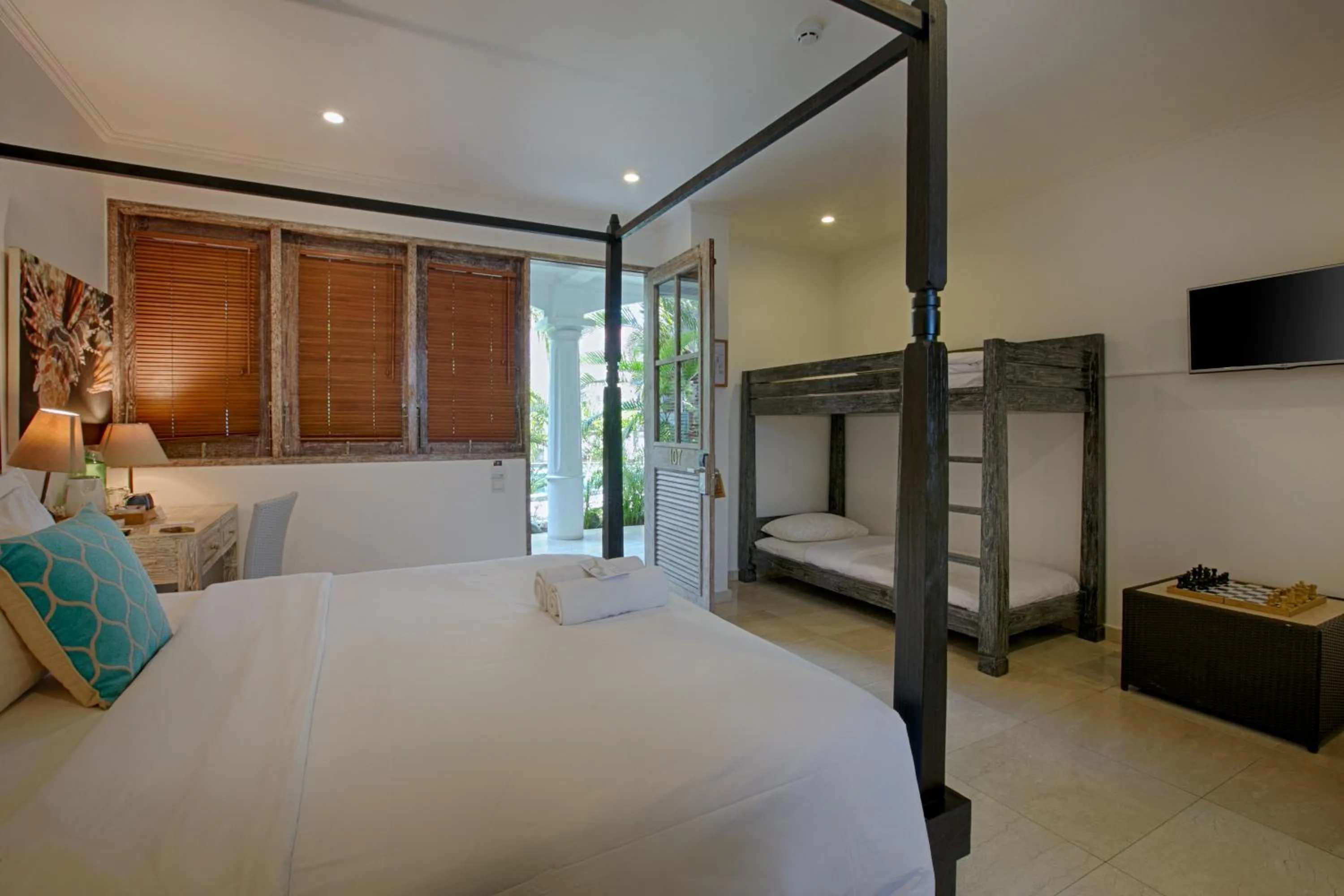 Bed in OK Divers Resort & Spa