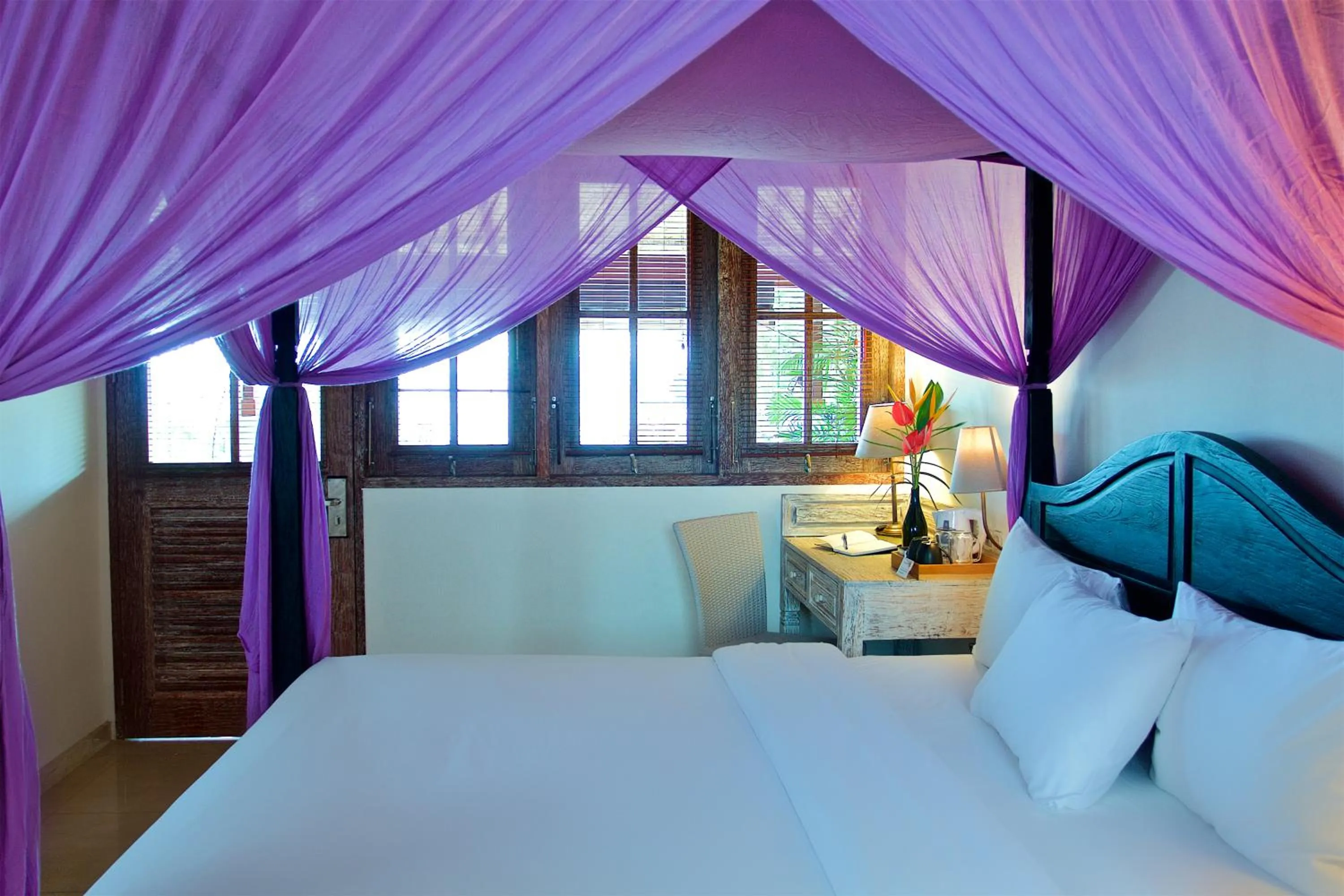 Bed in OK Divers Resort & Spa