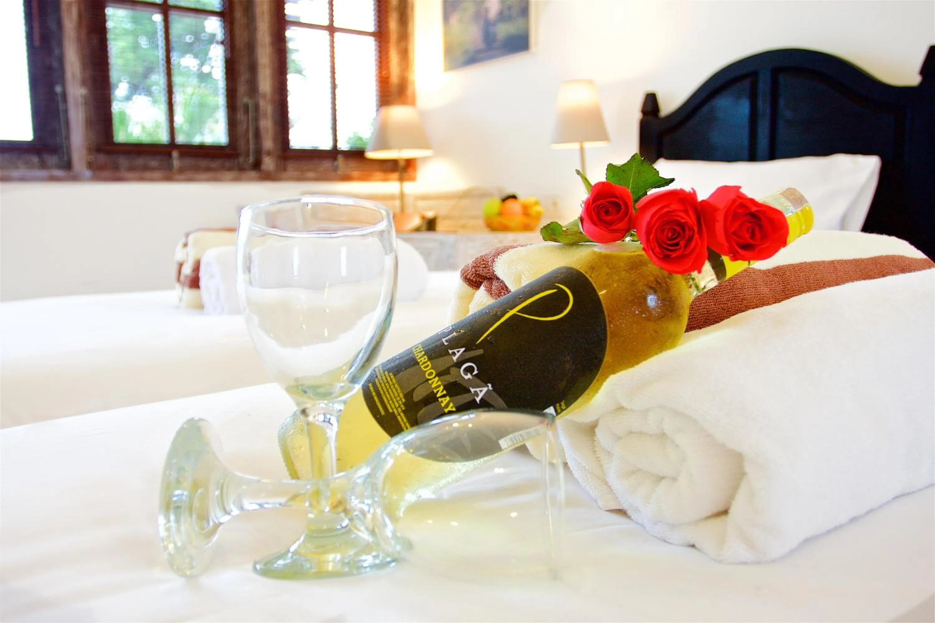 Bed in OK Divers Resort & Spa