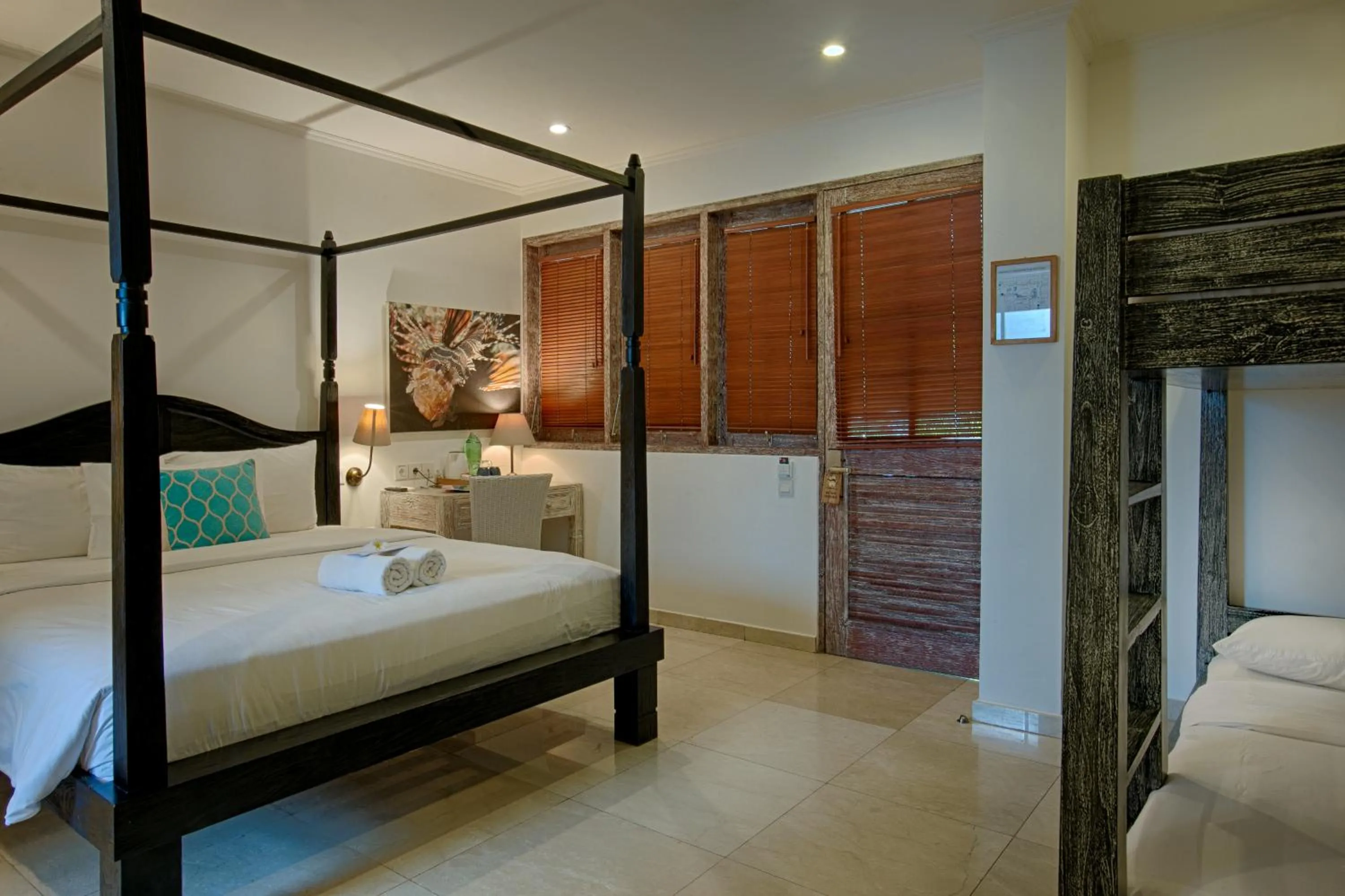 Bed in OK Divers Resort & Spa