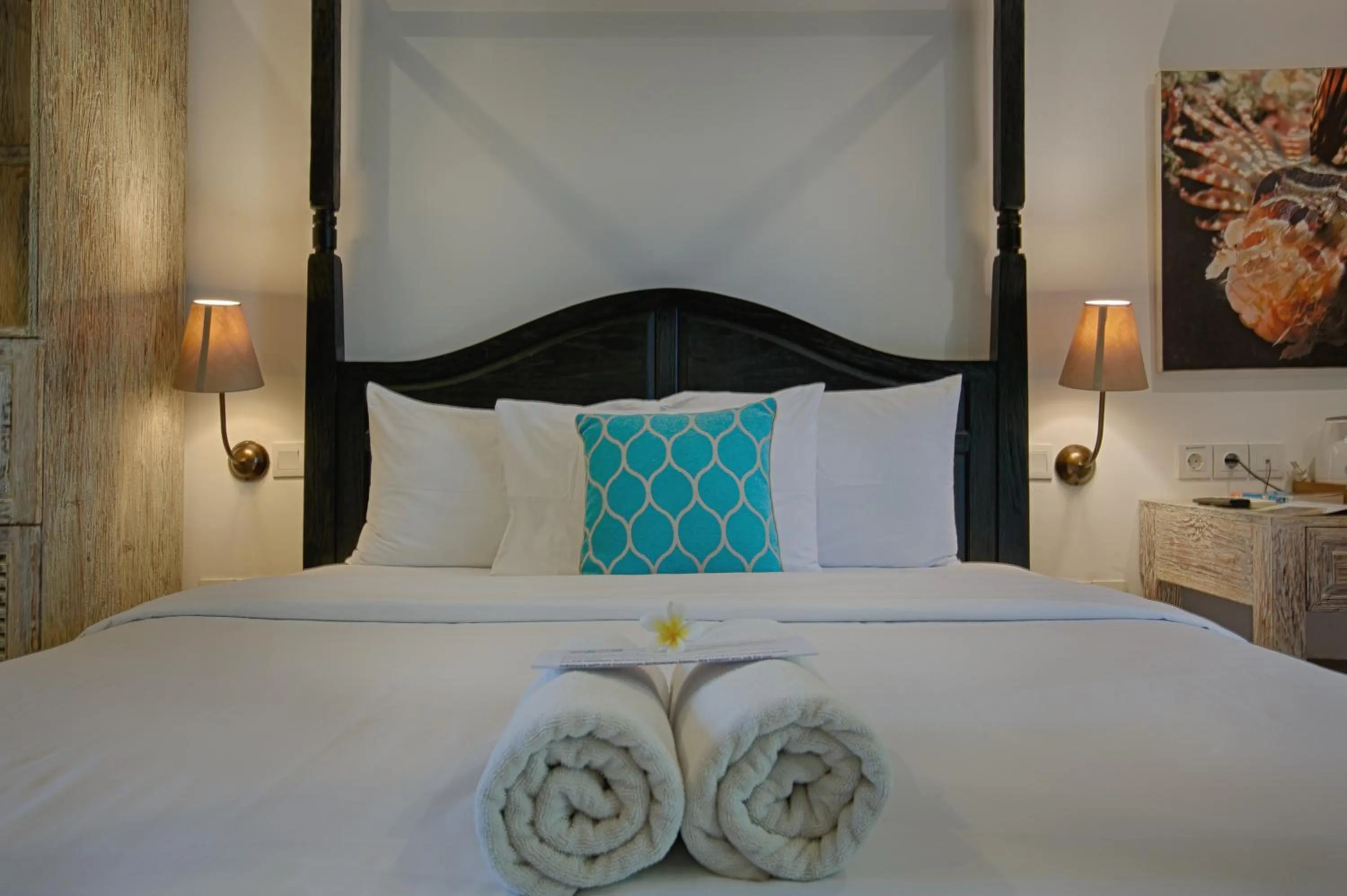 Bed in OK Divers Resort & Spa