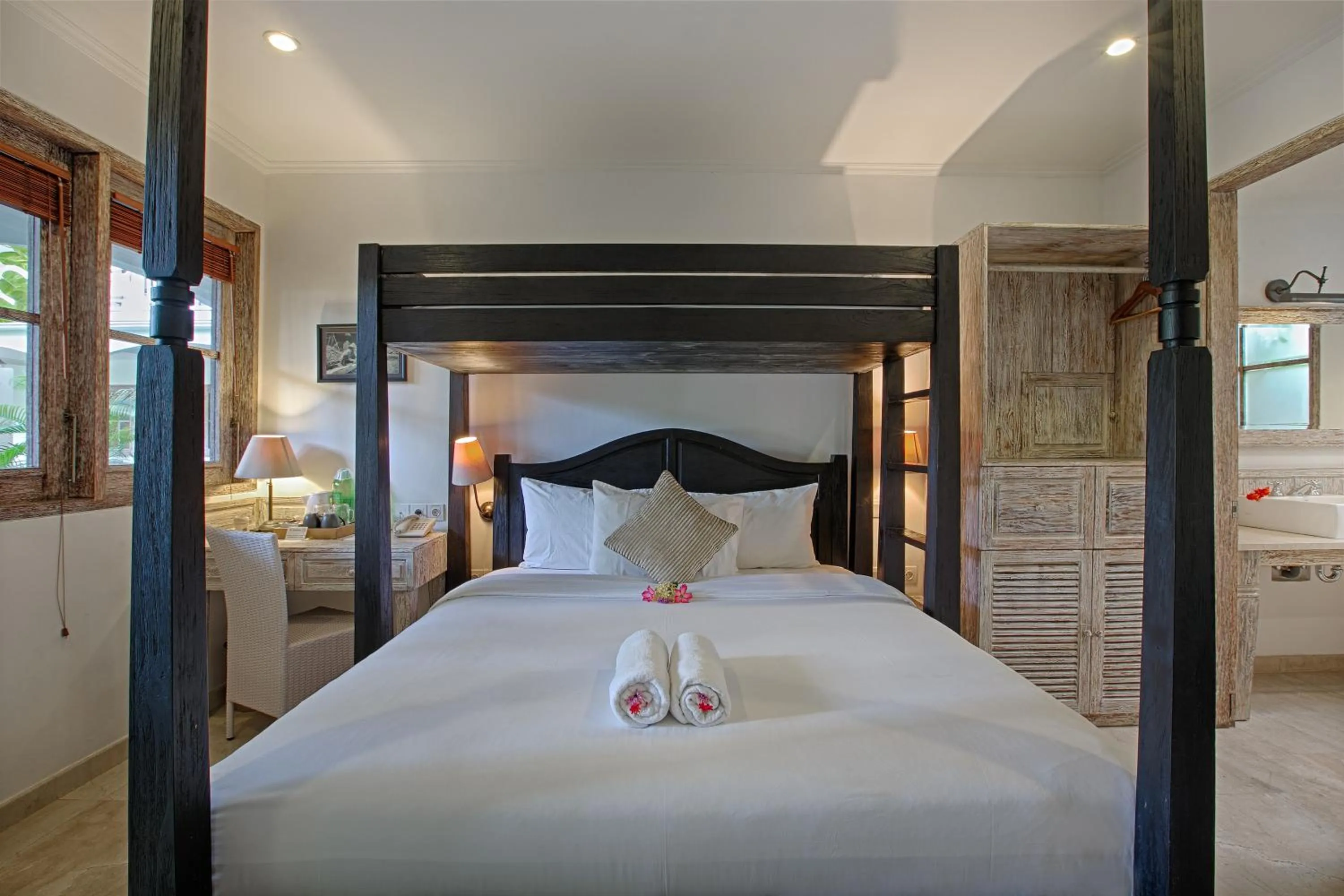 Bed in OK Divers Resort & Spa