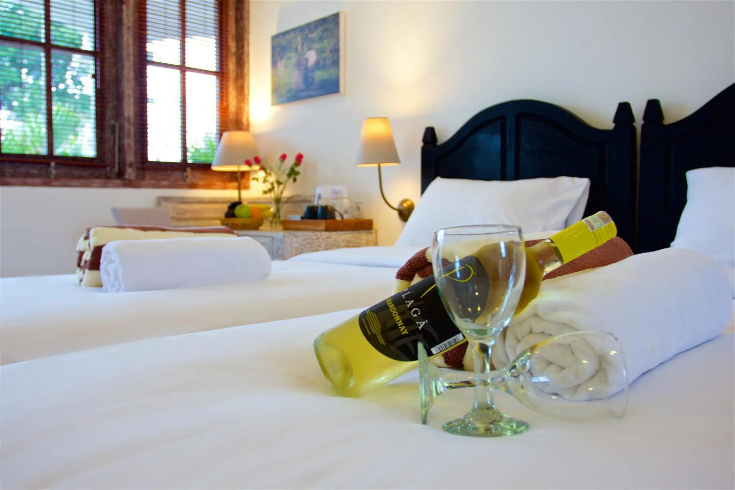 Bed in OK Divers Resort & Spa