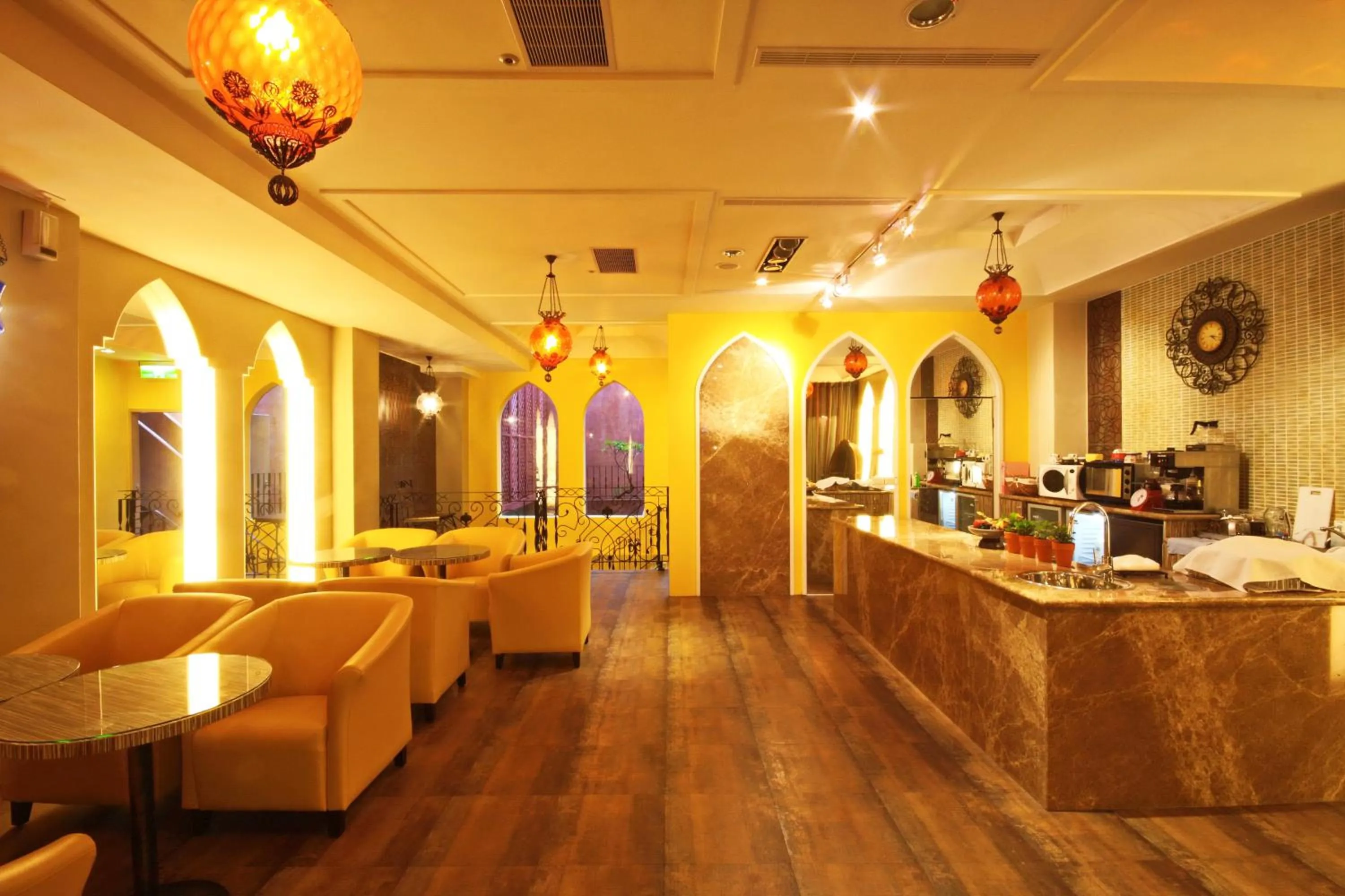 Communal lounge/ TV room in Moroccan Holiday Suite