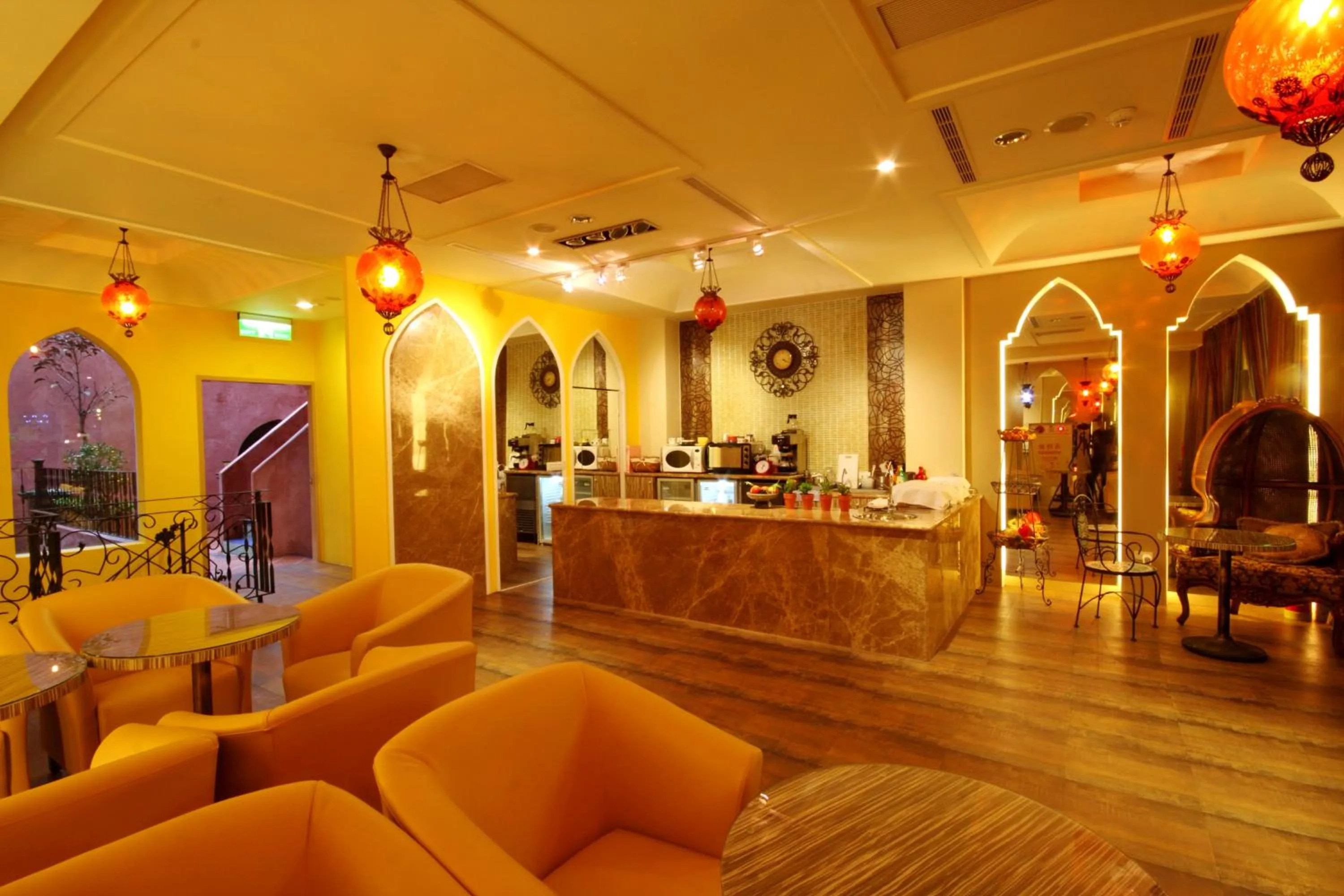 Communal lounge/ TV room in Moroccan Holiday Suite