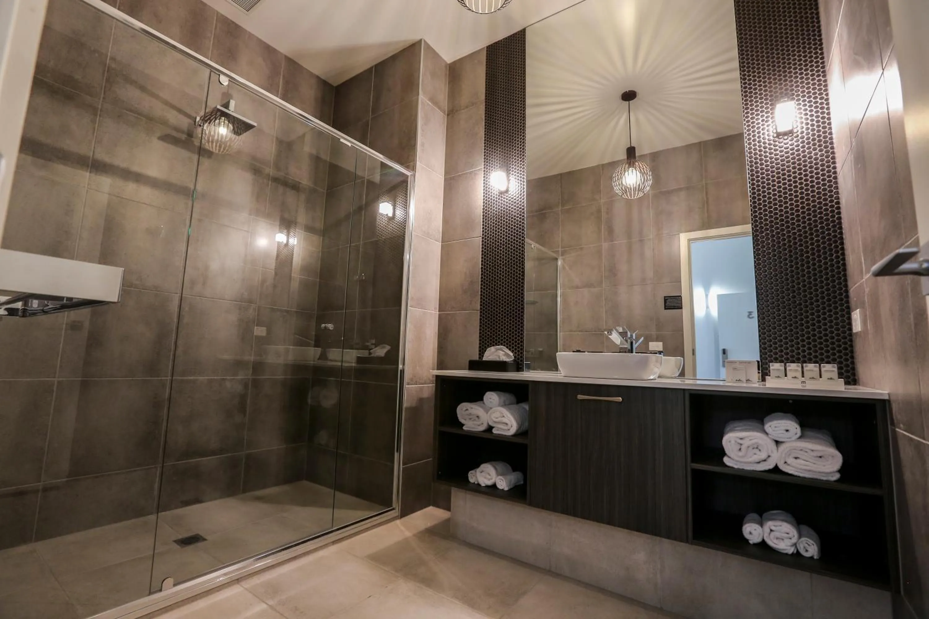 Shower in Indulge Apartments - CBD