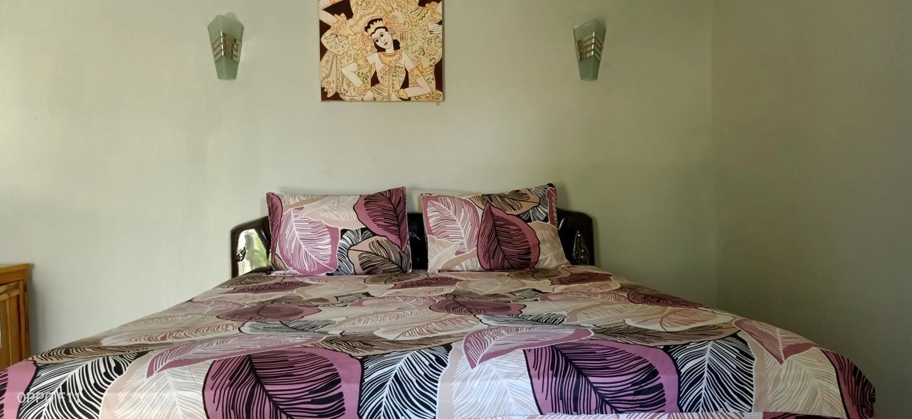 Bed in Tri Putri Homestay