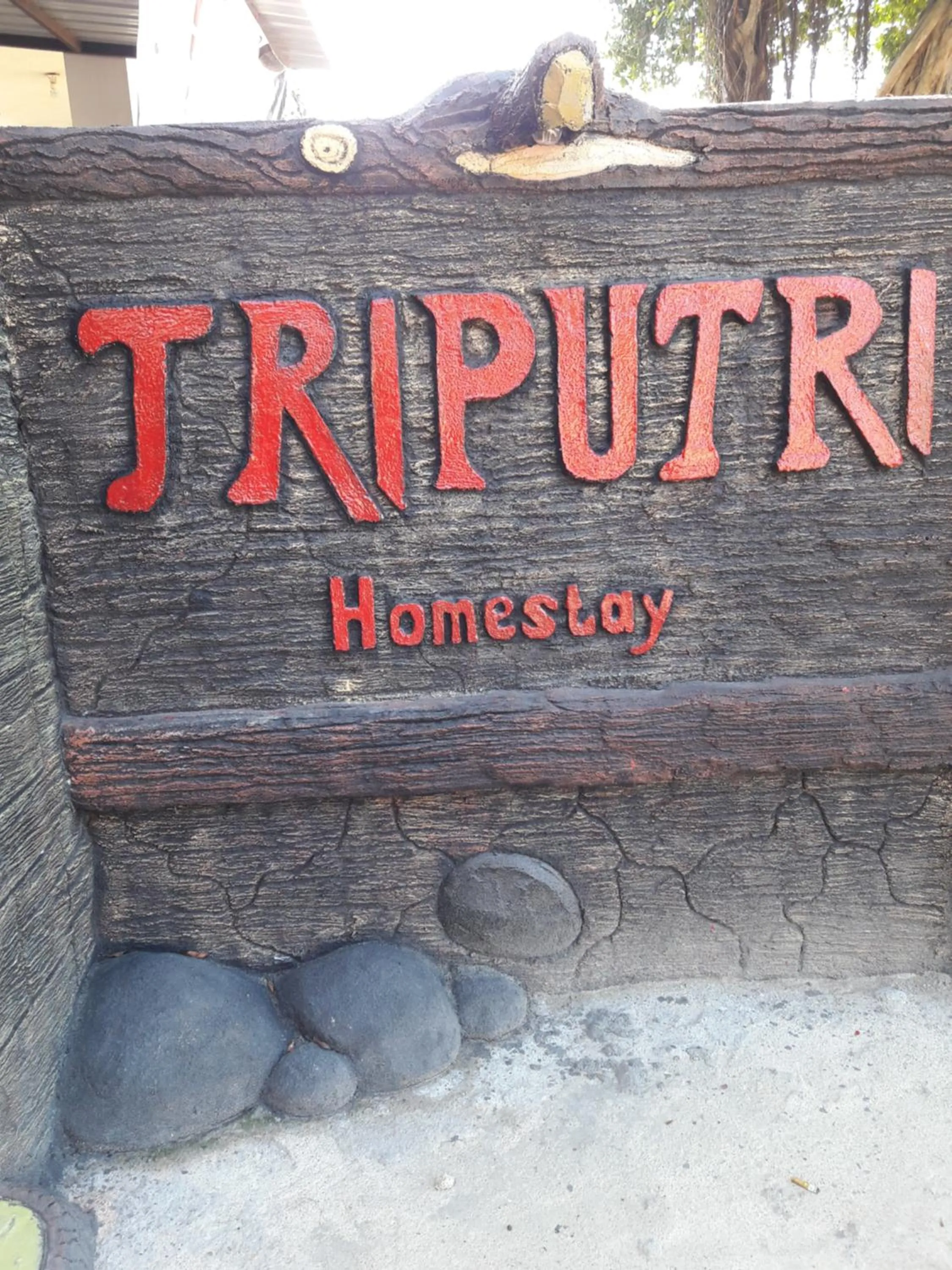Property logo or sign in Tri Putri Homestay