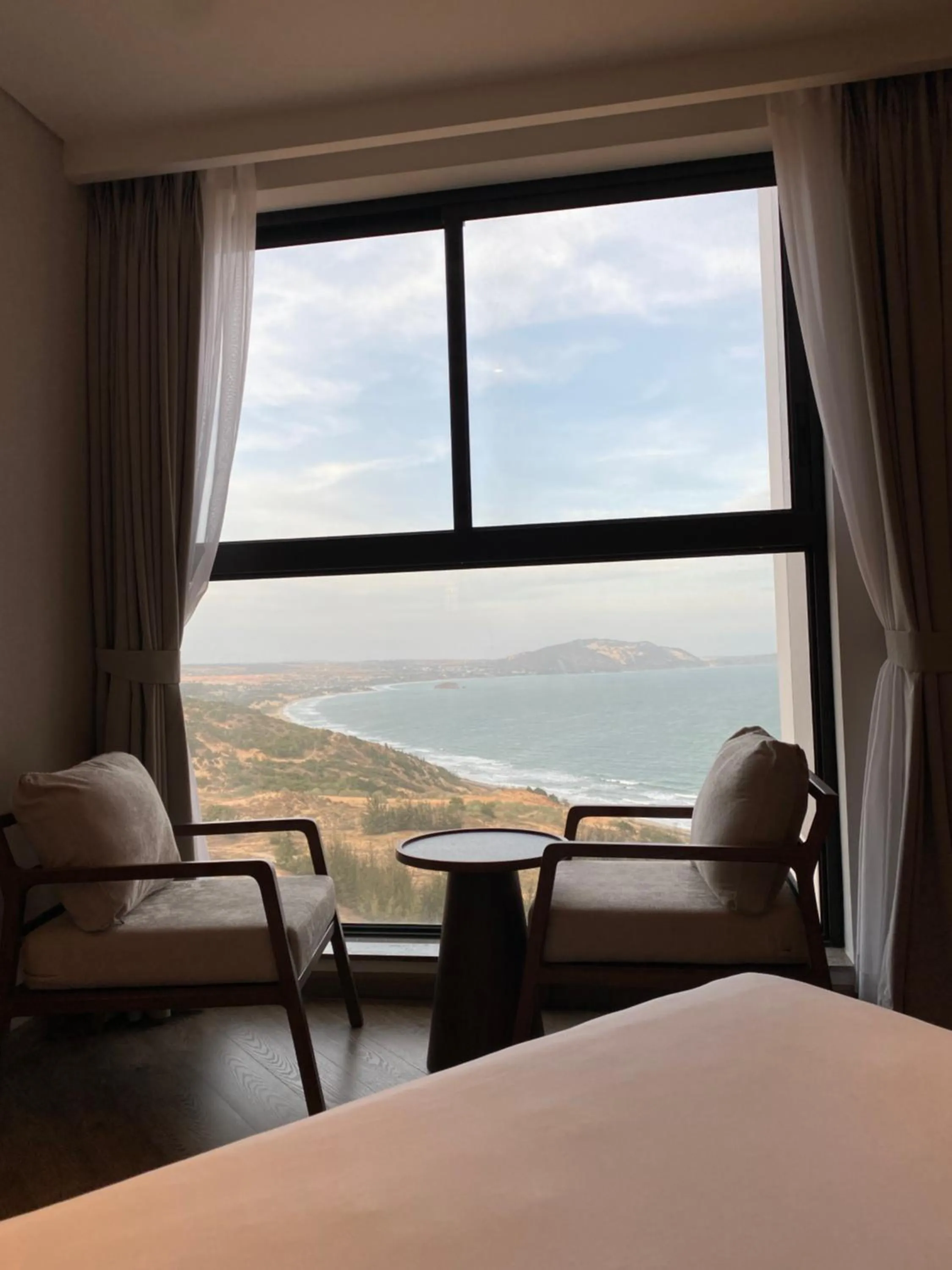 Seating area, Bed in Apec Mandala Ocean Retreat- Mui Ne