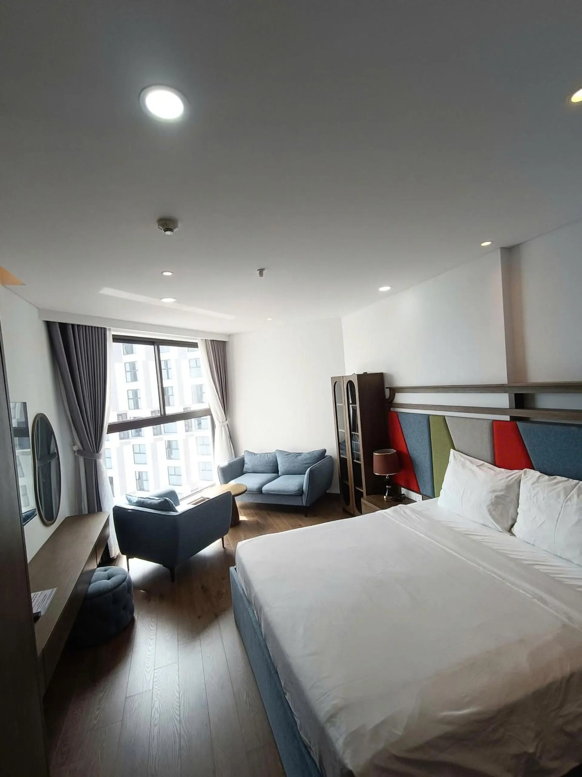 Photo of the whole room, Bed in Apec Mandala Ocean Retreat- Mui Ne