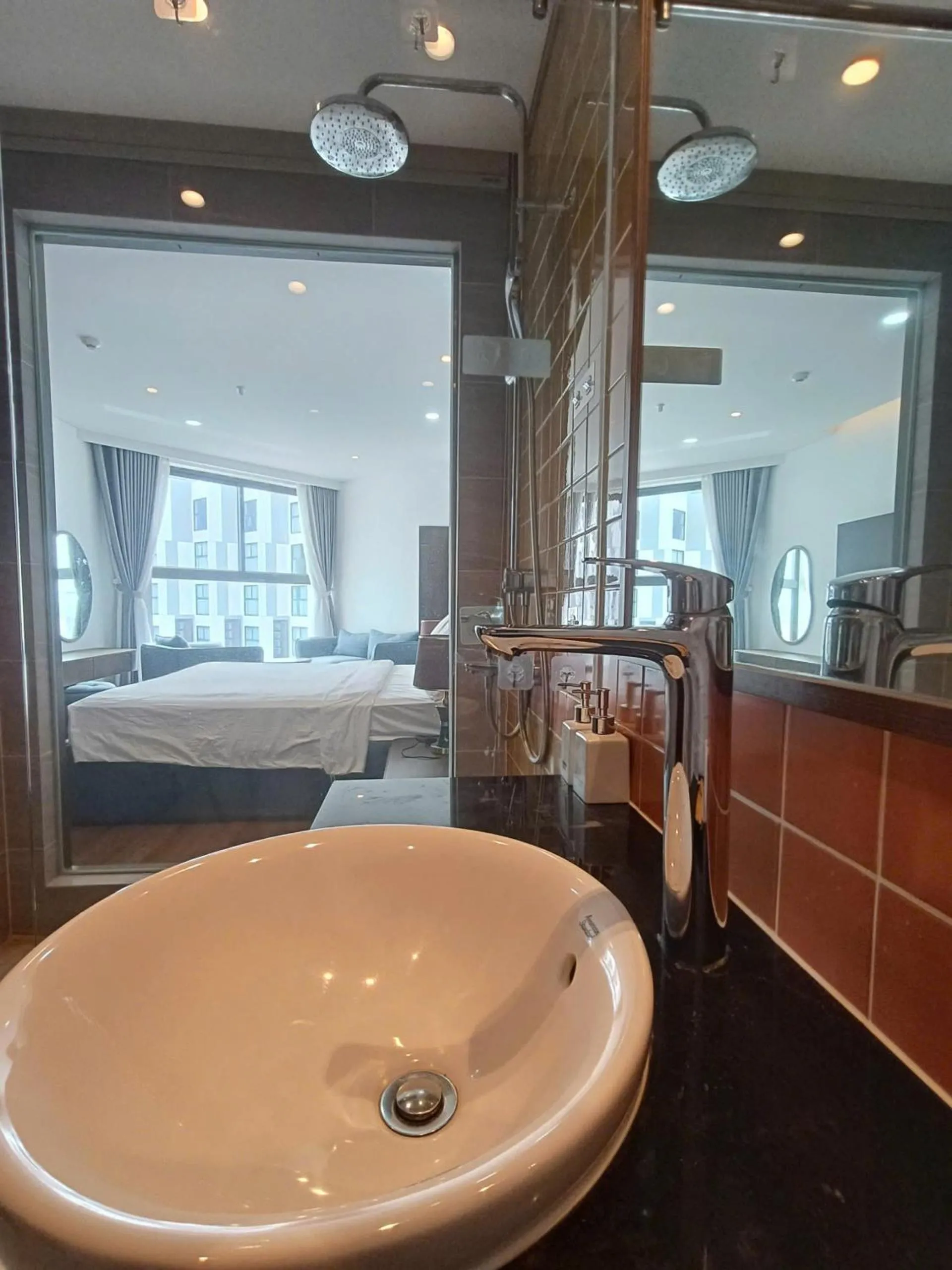 Bathroom, Bed in Apec Mandala Ocean Retreat- Mui Ne