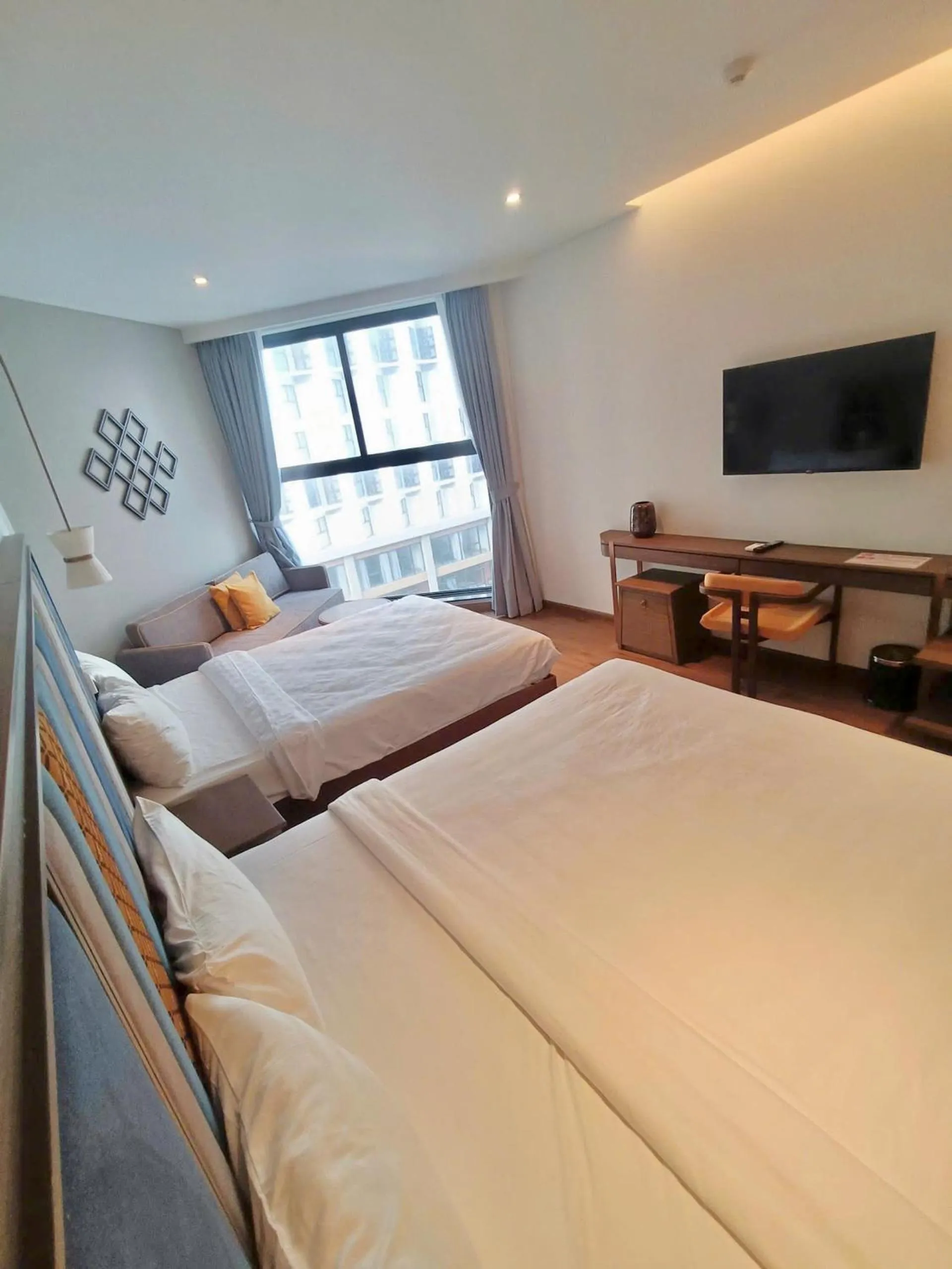 Photo of the whole room, Bed in Apec Mandala Ocean Retreat- Mui Ne