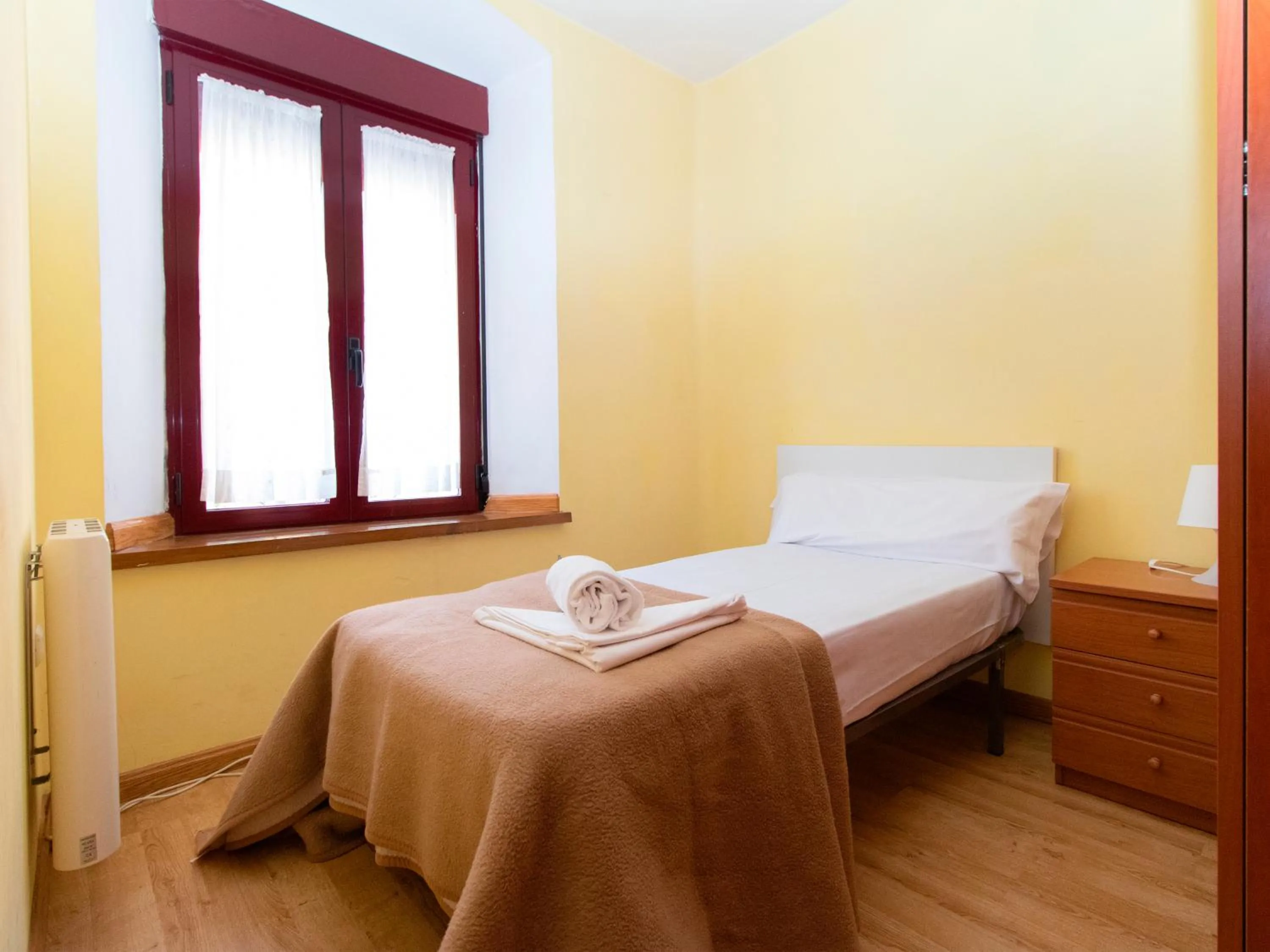Bed in Apartamentos Canfranc 3000