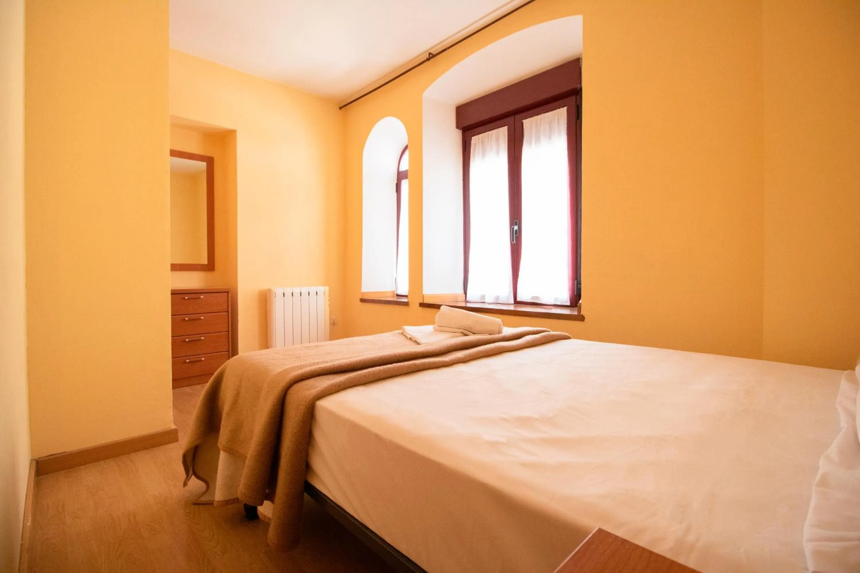 Bed in Apartamentos Canfranc 3000