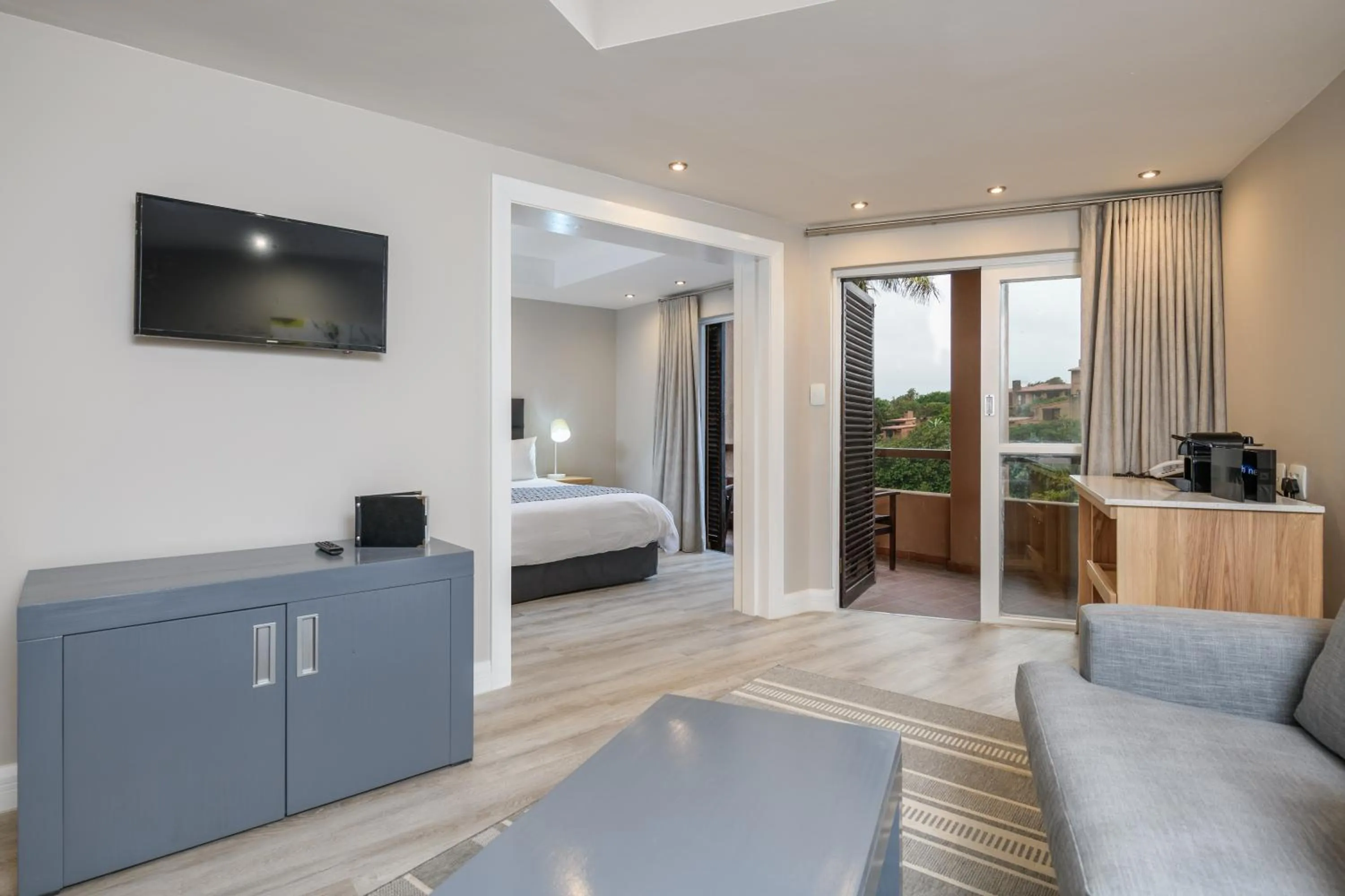 Living room, Bed in San Lameer Resort Hotel & Spa