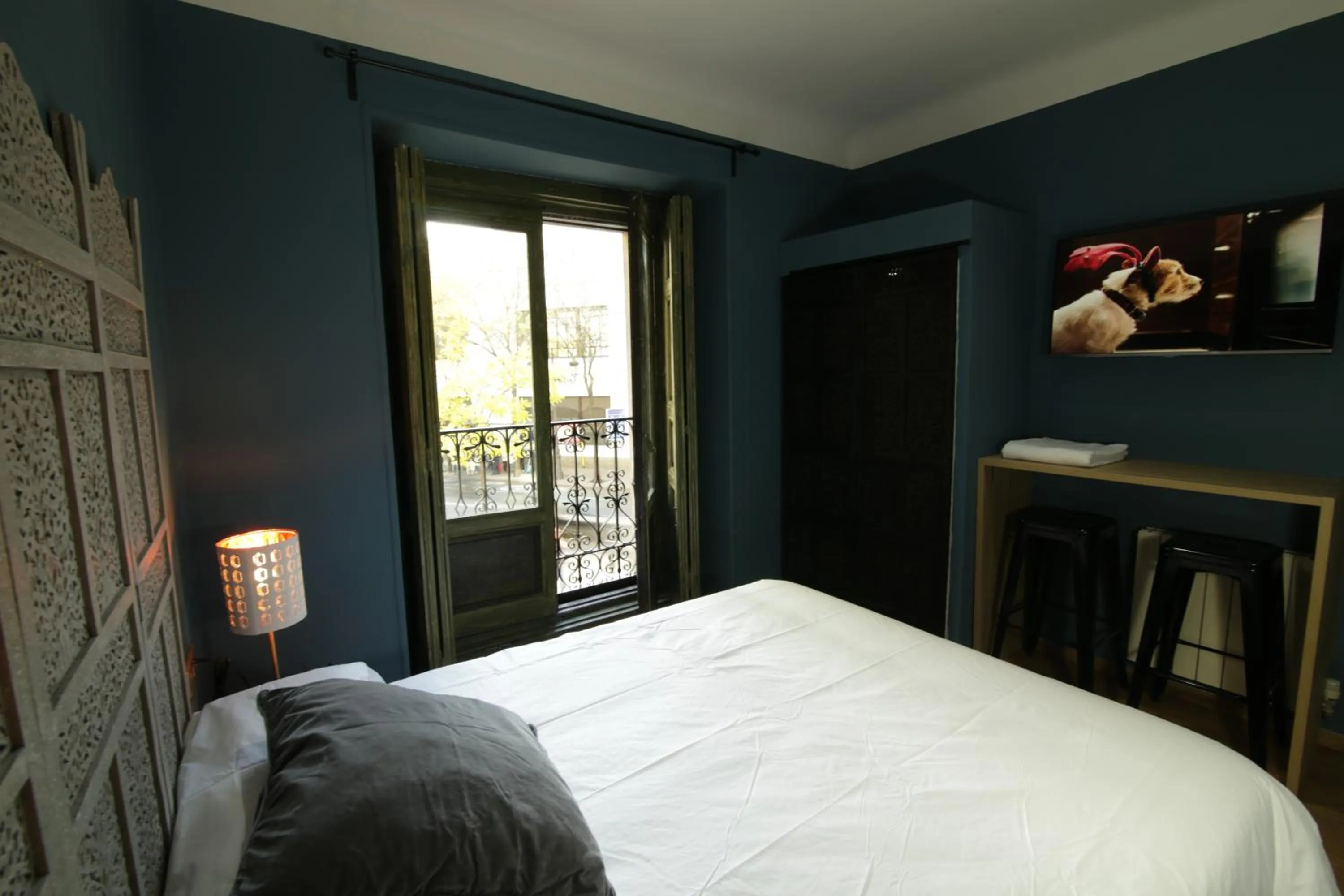 Photo of the whole room, Bed in AbraCadabra Suites