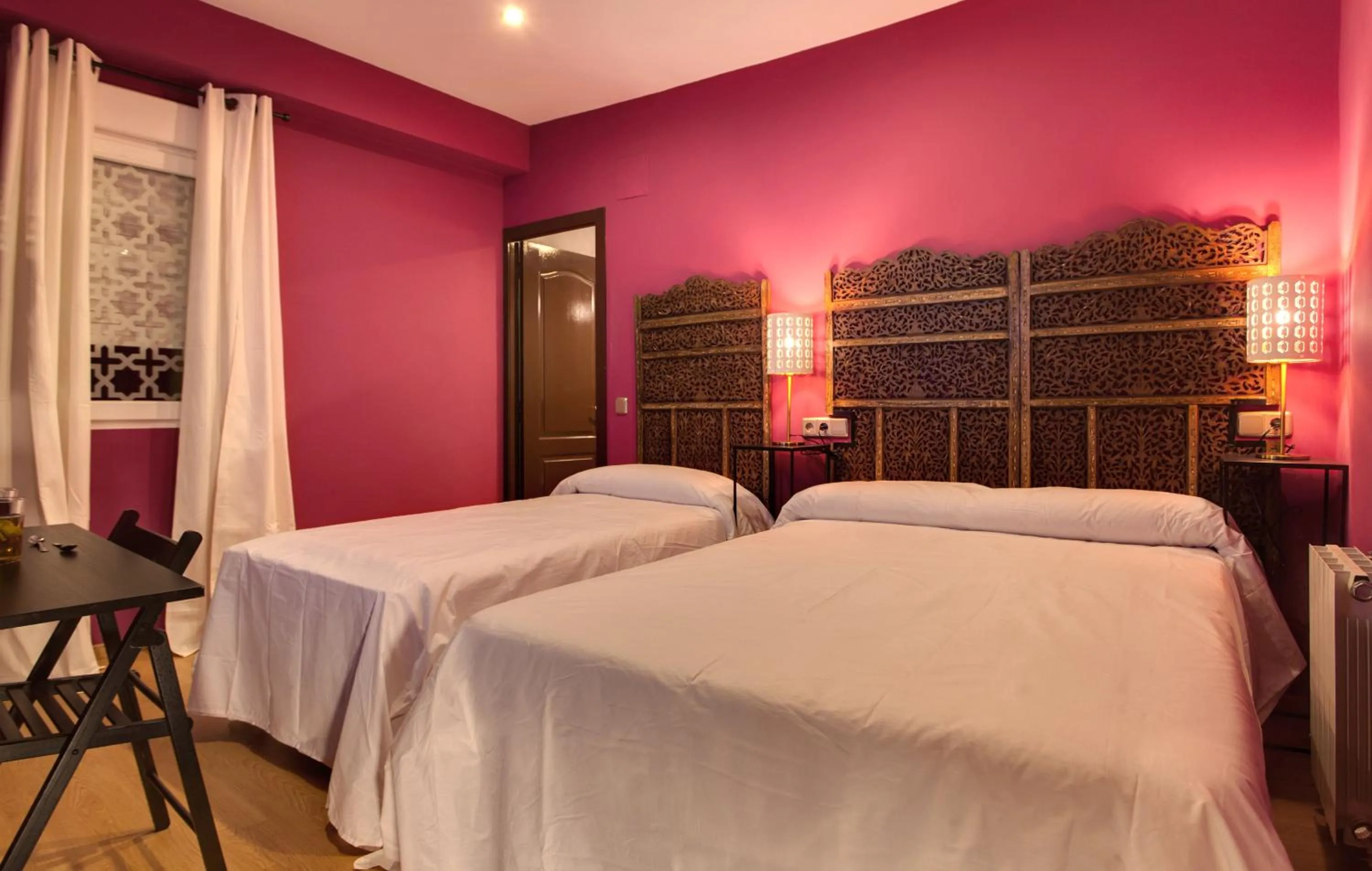 Photo of the whole room, Bed in AbraCadabra Suites