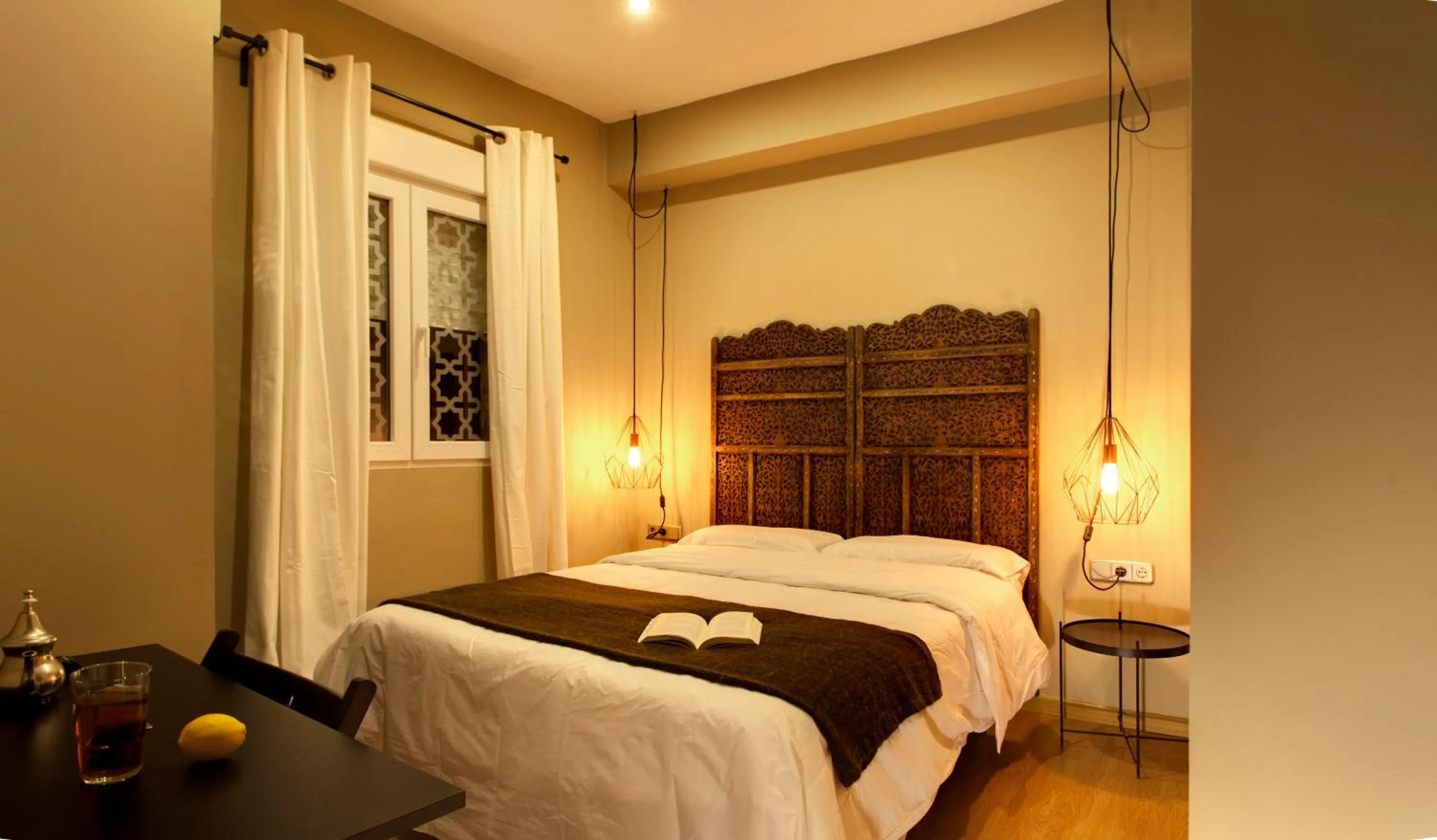 Photo of the whole room, Bed in AbraCadabra Suites