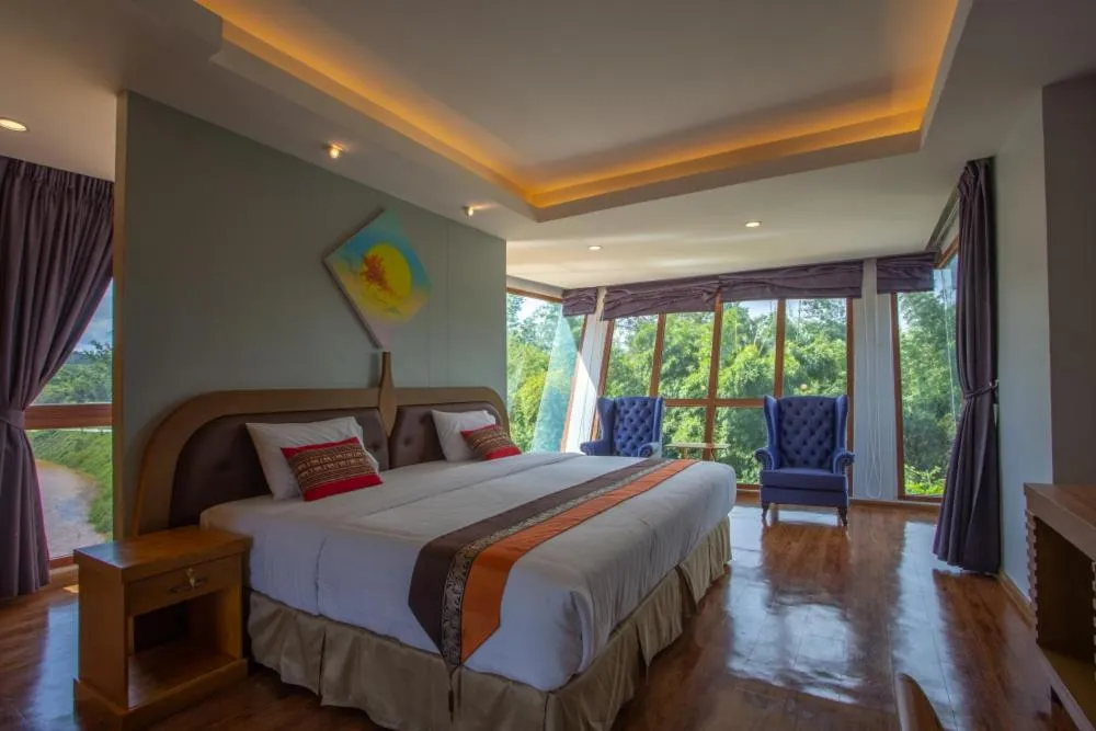 Bed in Phurua Sanctuary Resort and Spa