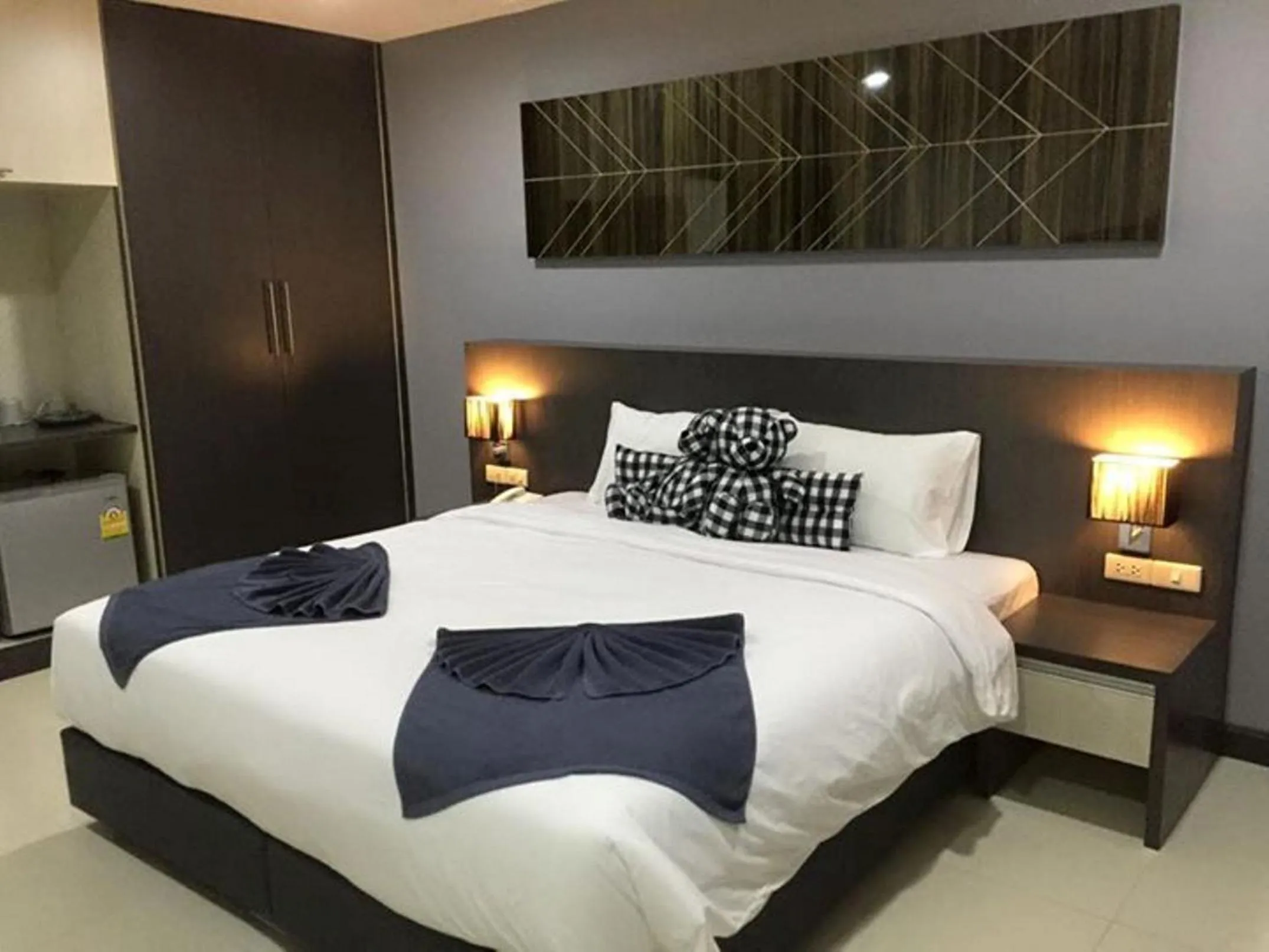 Bed in At Sakon Hotel