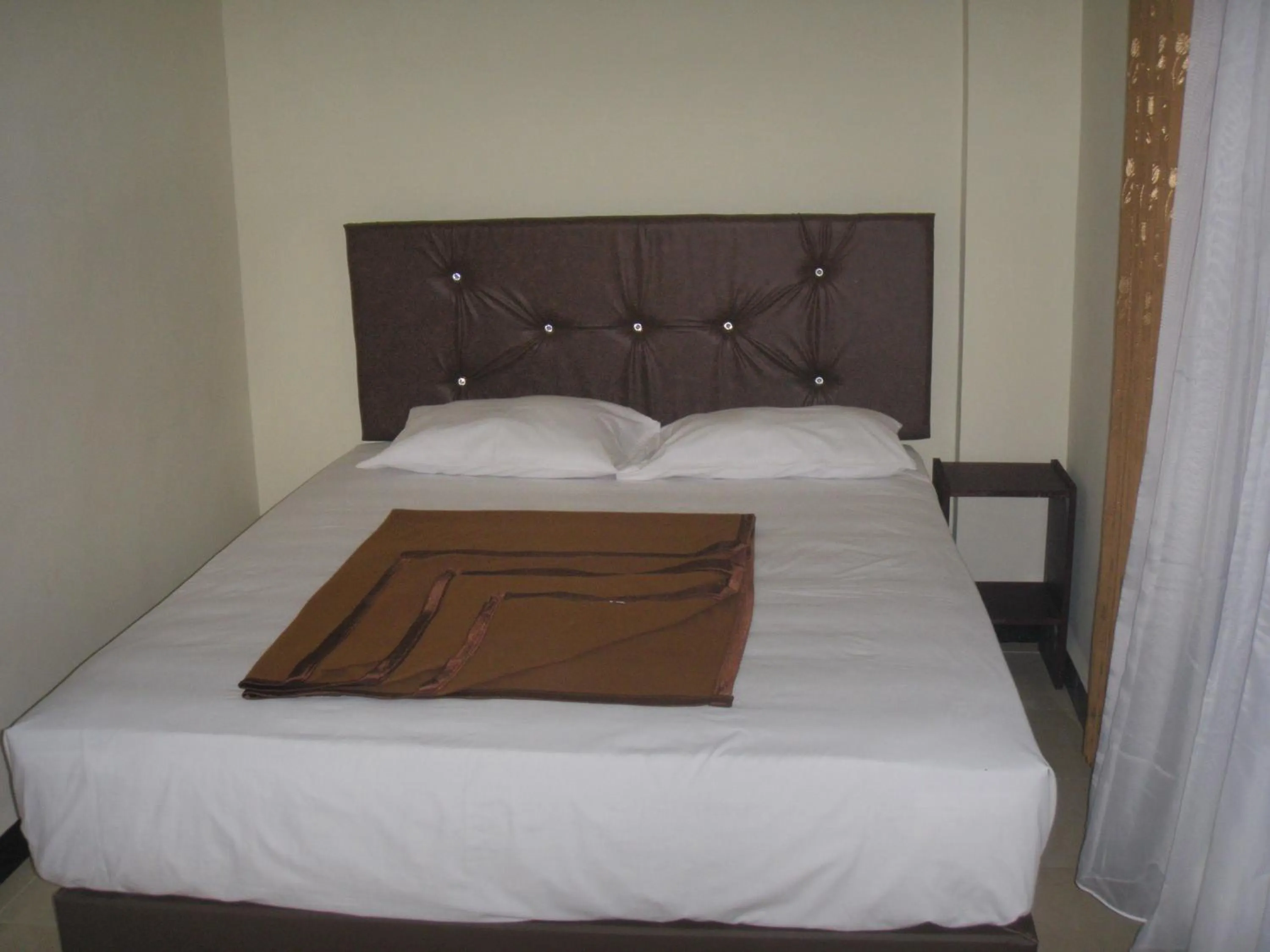 Bed in Dena Hotel