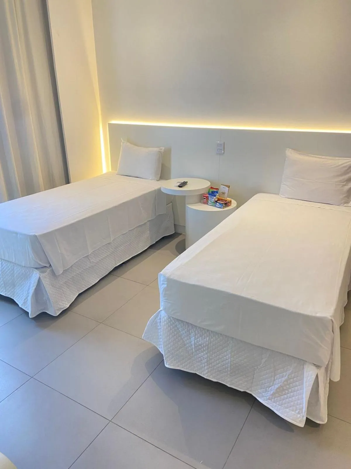 Bed in Golden Tower Shopping by Fênix Hotéis