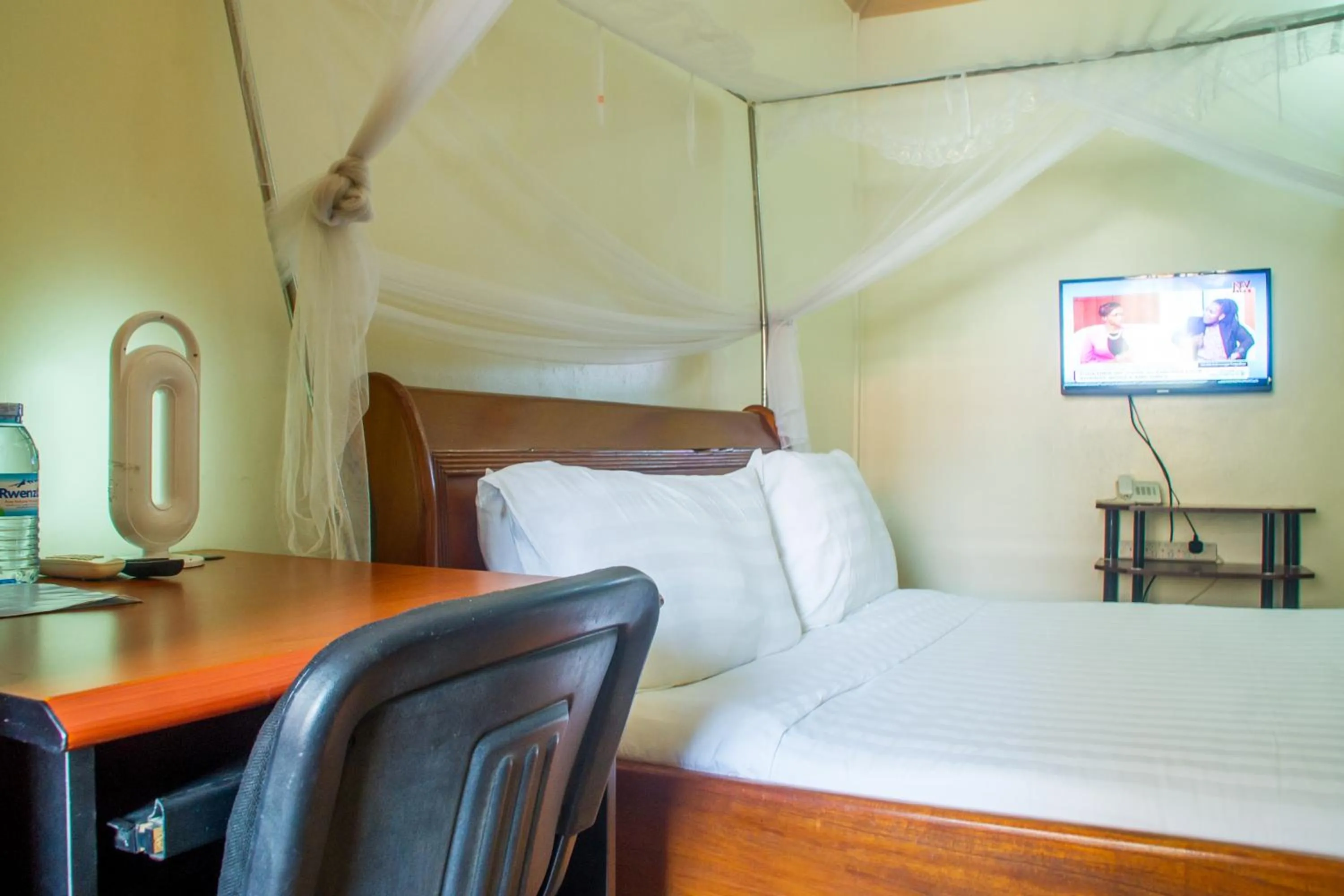 Photo of the whole room, Bed in Sandton Hotel Kasese