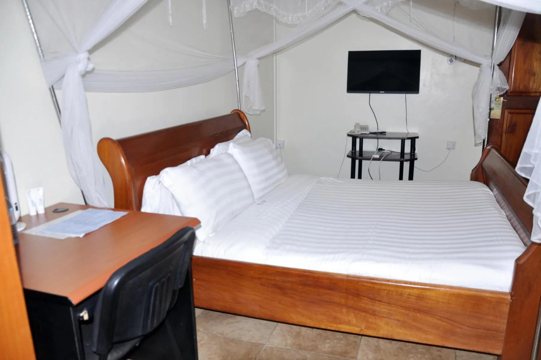 Bed in Sandton Hotel Kasese