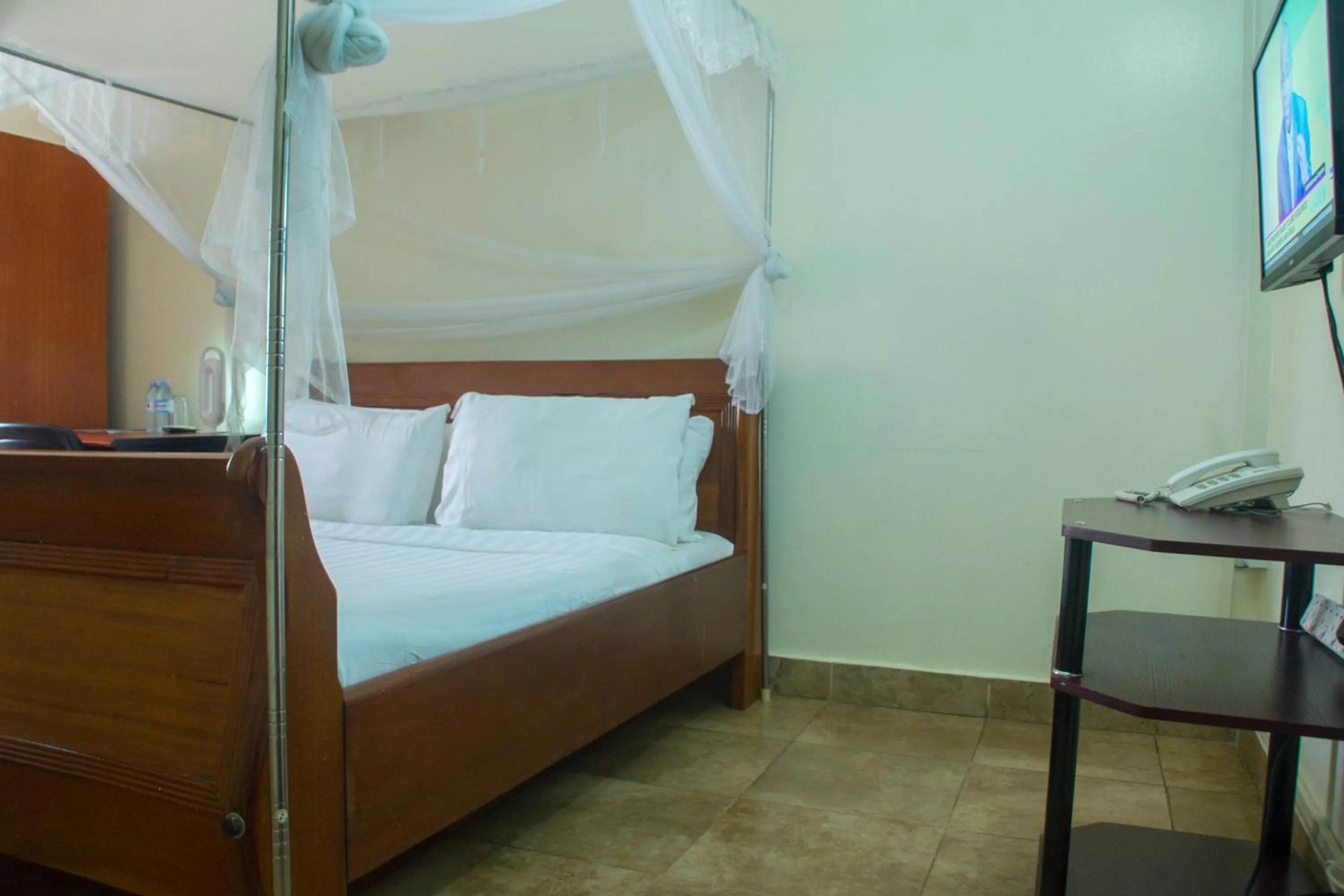 Bed in Sandton Hotel Kasese