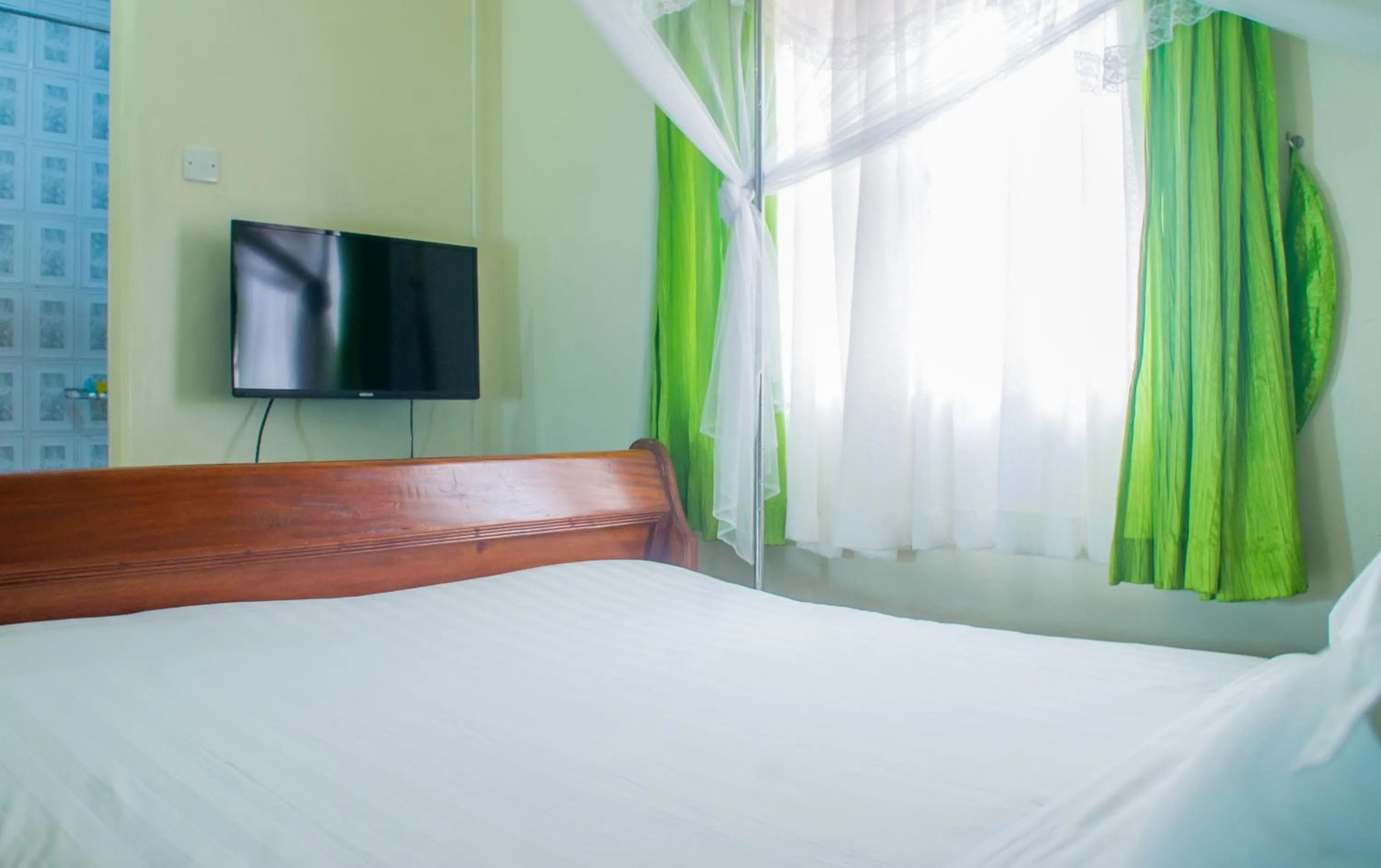 Bed in Sandton Hotel Kasese