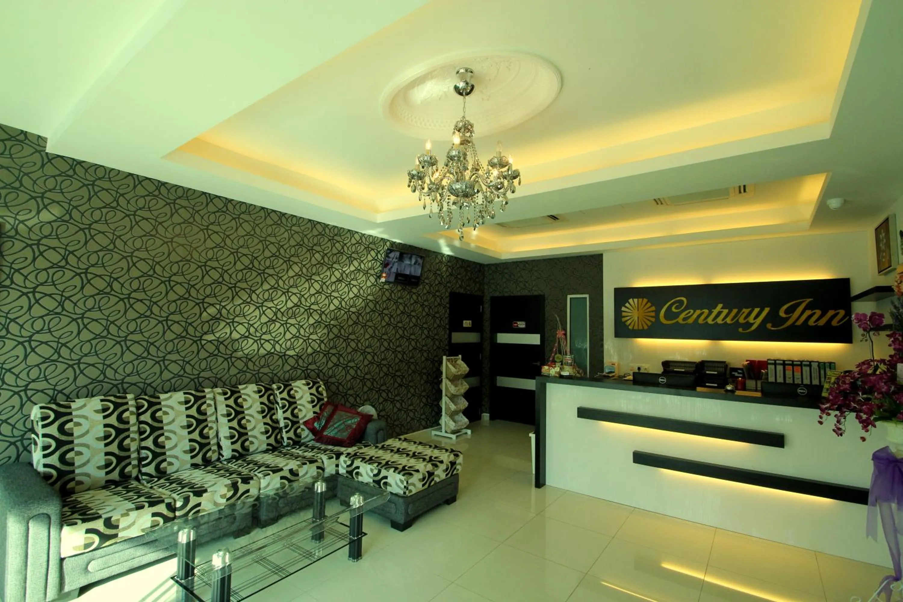 Lobby or reception in Century Inn Hotel