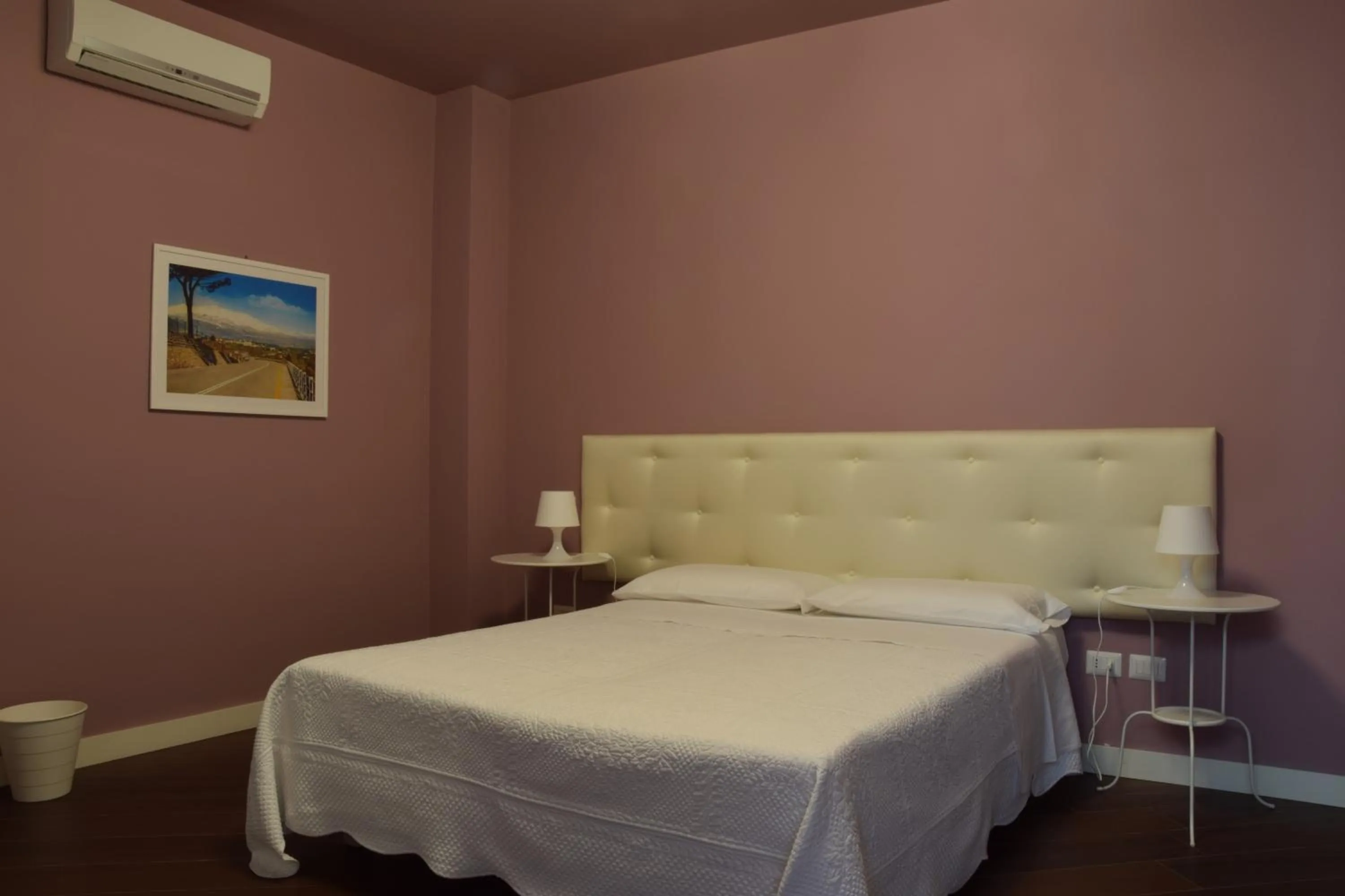 Photo of the whole room, Bed in Residenza Cavour